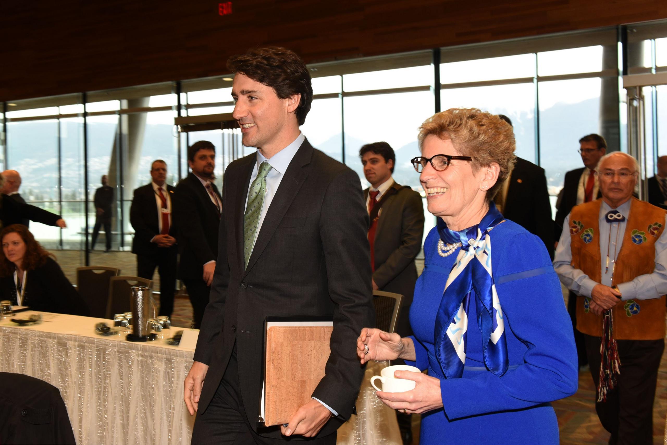 Prime Minister Justin Trudeau and Ontario Premier Kathleen Wynne arrive at the First Ministers Meeting in Vancouver on March 2, 2016