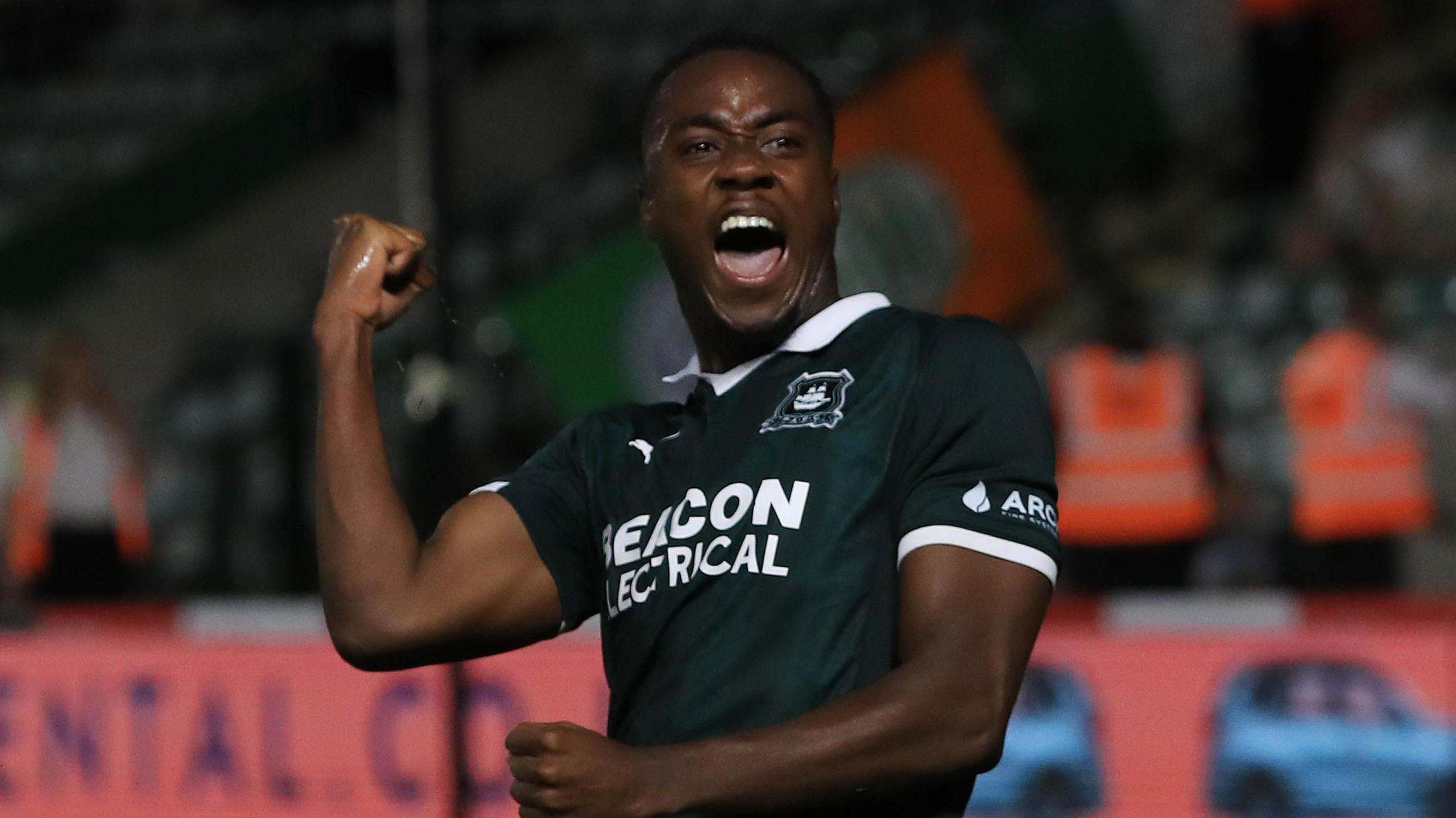 Owen Oseni celebrates scoring on his Argyle debut