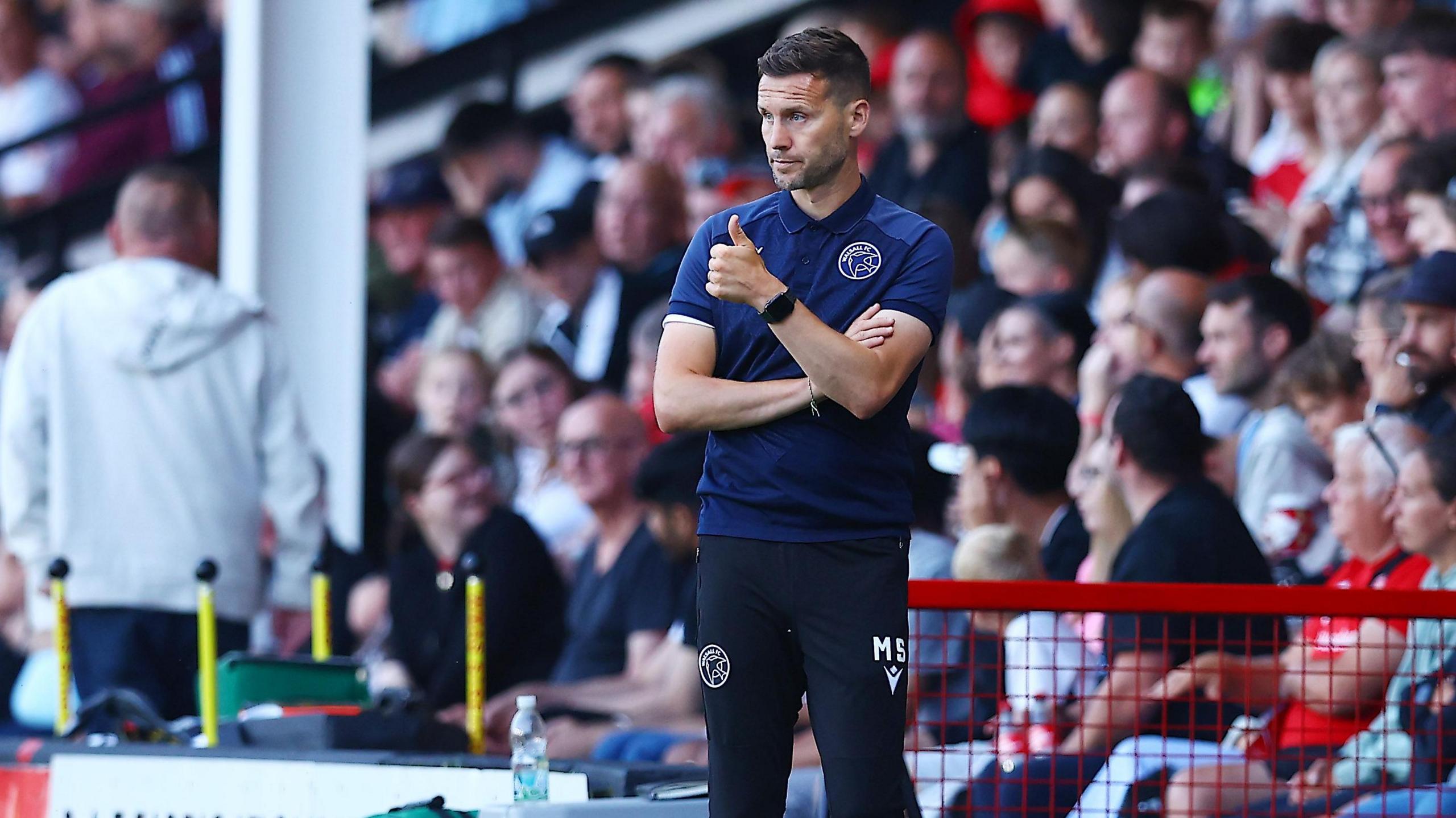 Mat Sadler gives a thumbs-up during a pre-season friendly against Aston Villa