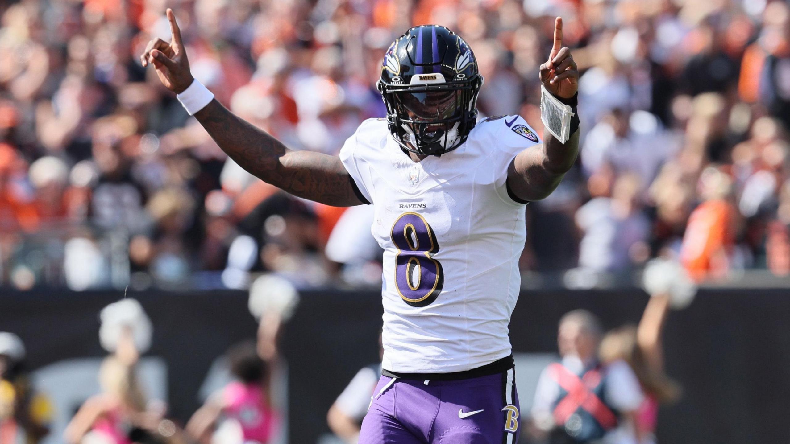 Lamar Jackson celebrates the Baltimore Ravens beating the Cincinnati Bengals in the NFL