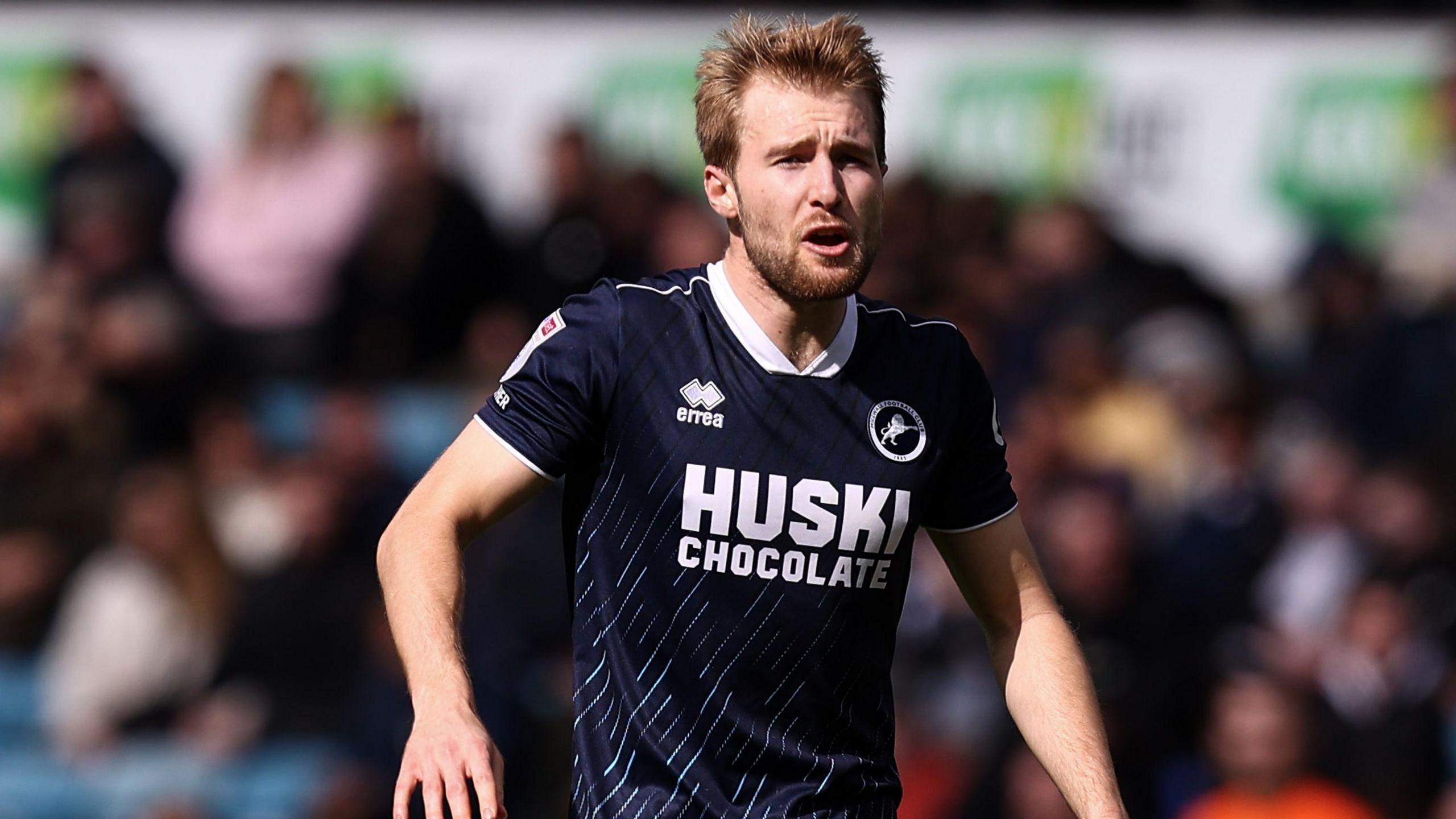 Millwall midfielder Billy Mitchell on the field