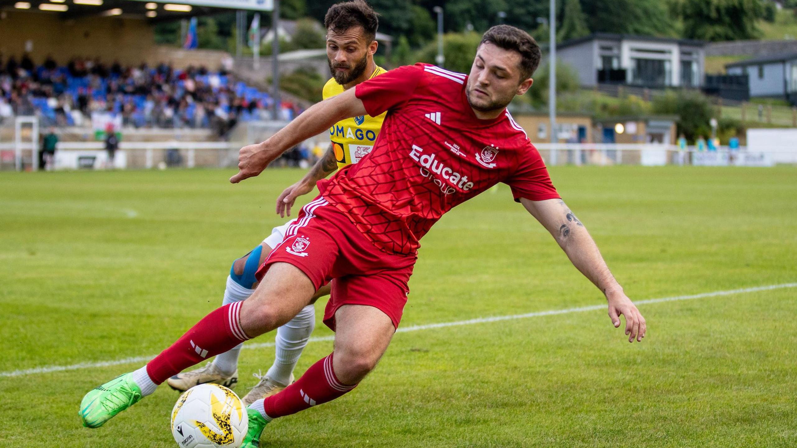 Connah's Quay Nomads' Elliott Dugan in action against NK Bravo