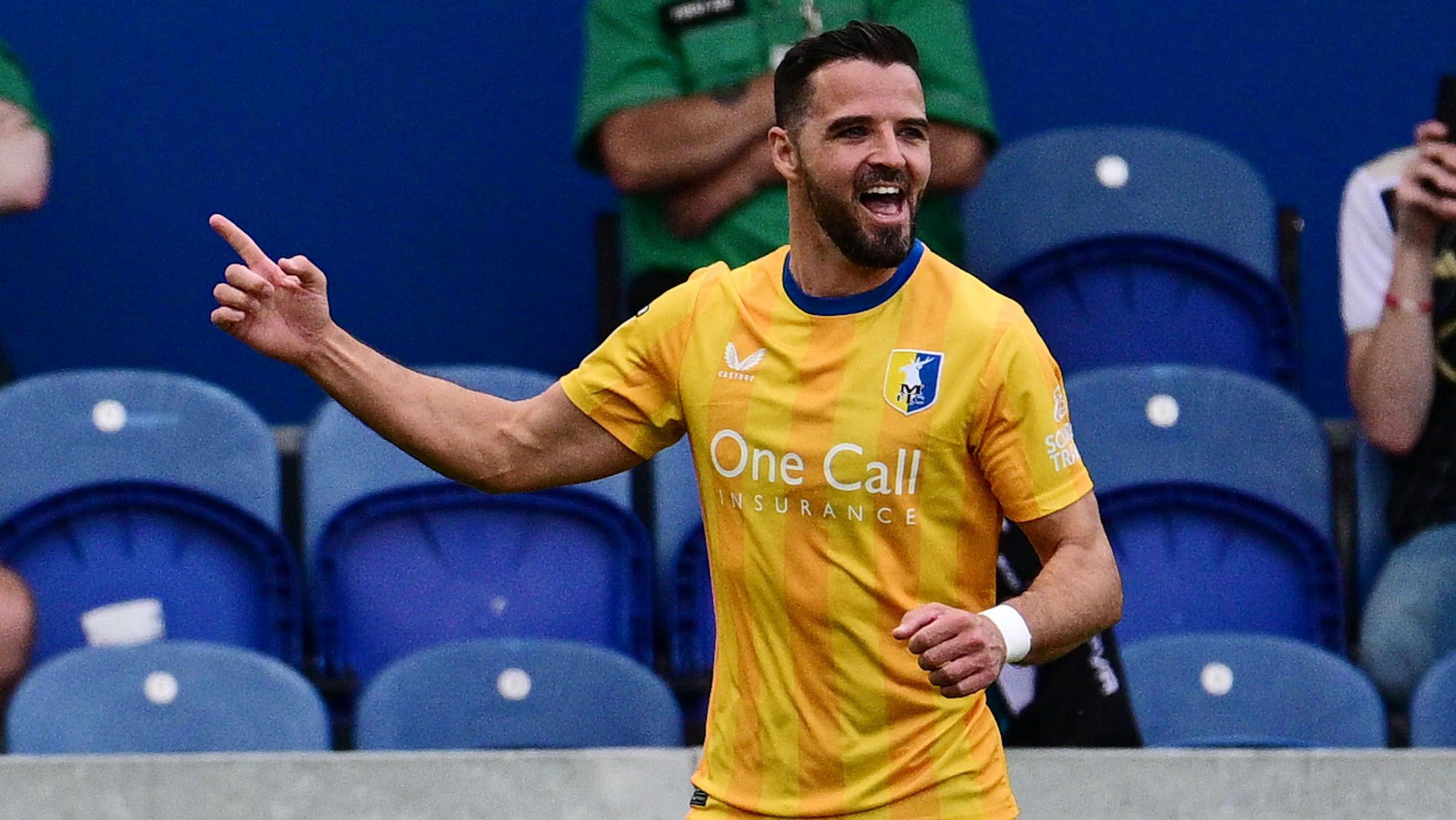 Stephen McLaughlin celebrates for Mansfield Town scoring against Exeter City