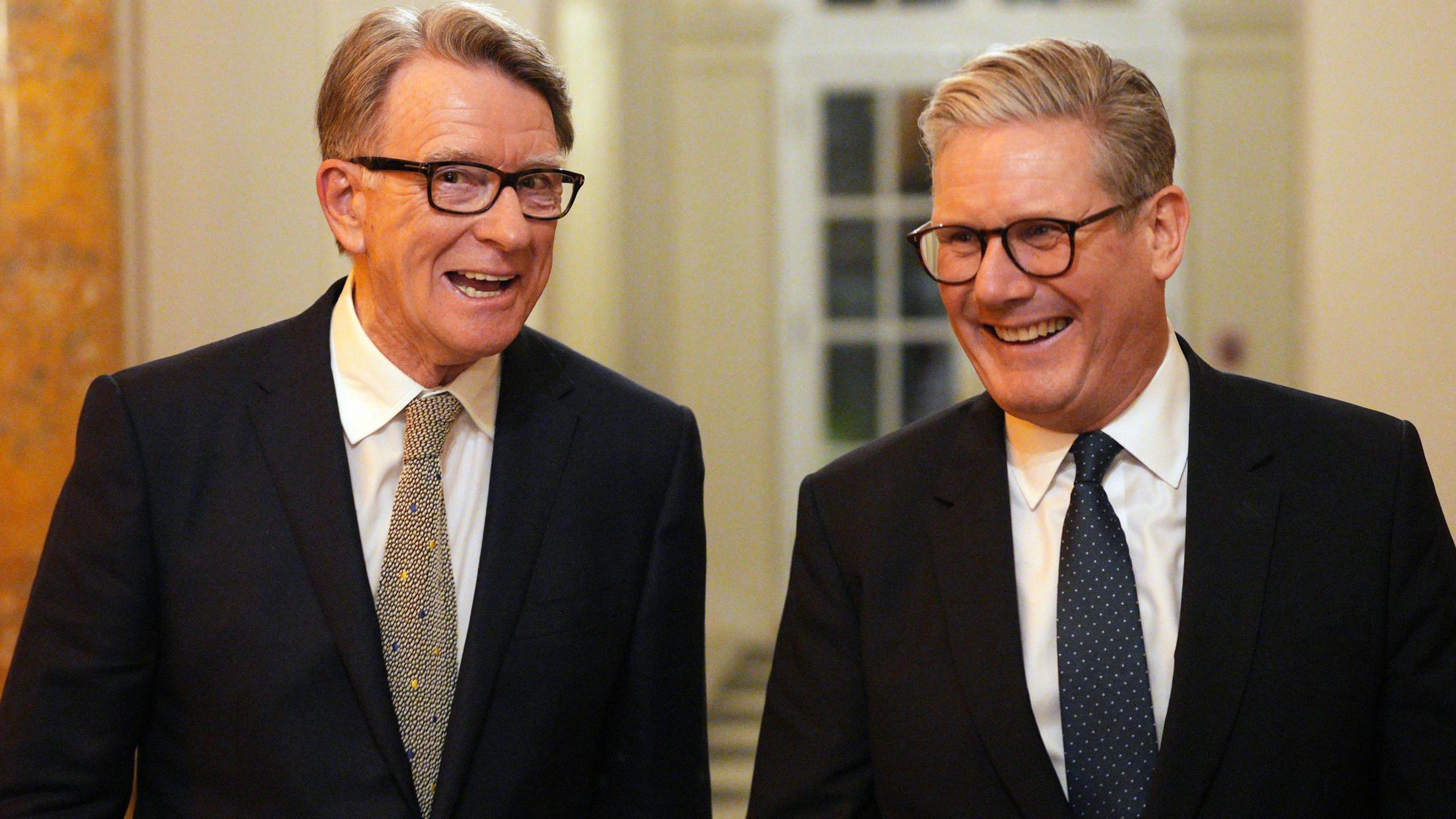 Mandelson and Starmer walk side by side (file photo from February 2025)