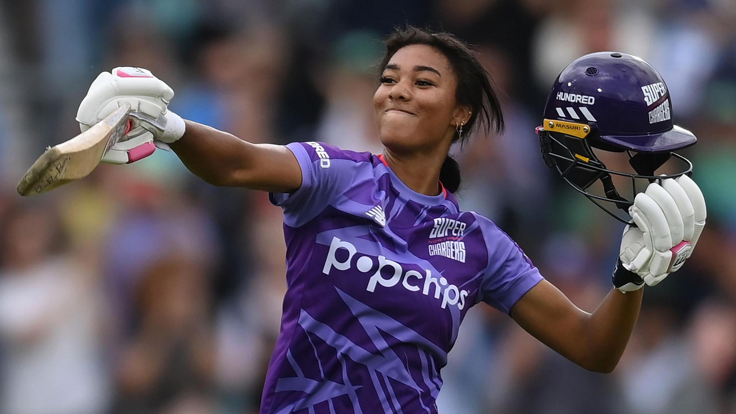 Northern Superchargers batter Davina Perrin celebrates hitting a century