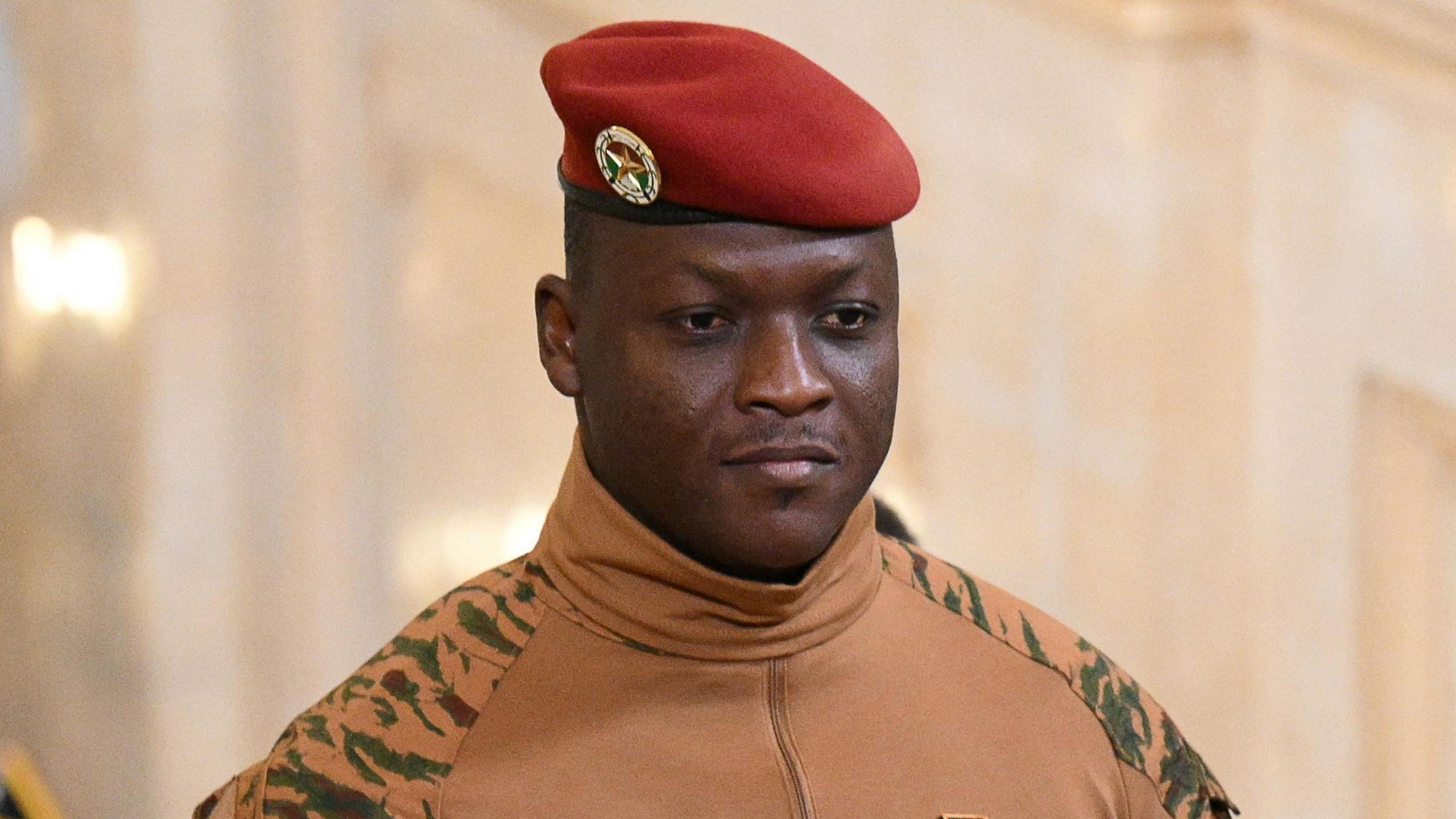 Burkina Faso's military leader Ibrahim Traore in military uniform and a red beret