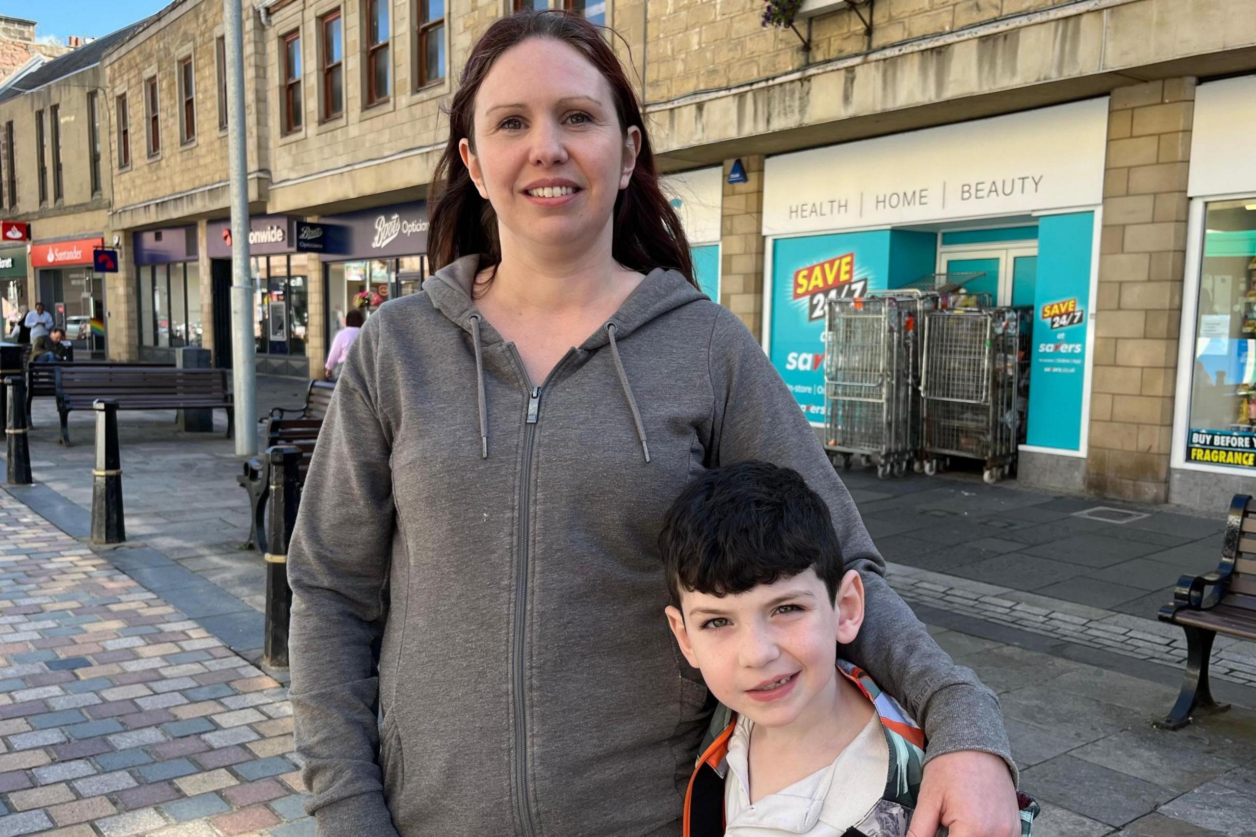 Samantha Calvert is standing in an Inverness street with her son. 