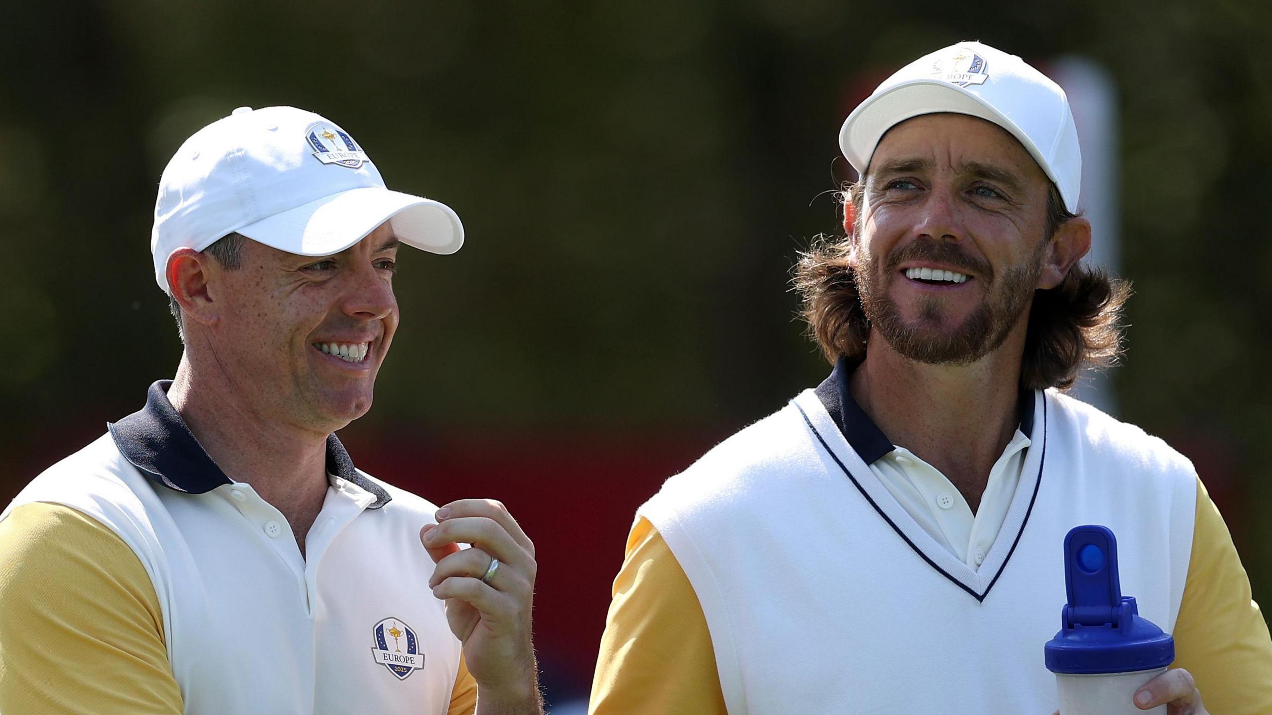 Rory McIlroy and Tommy Fleetwood during practice at Bethpage