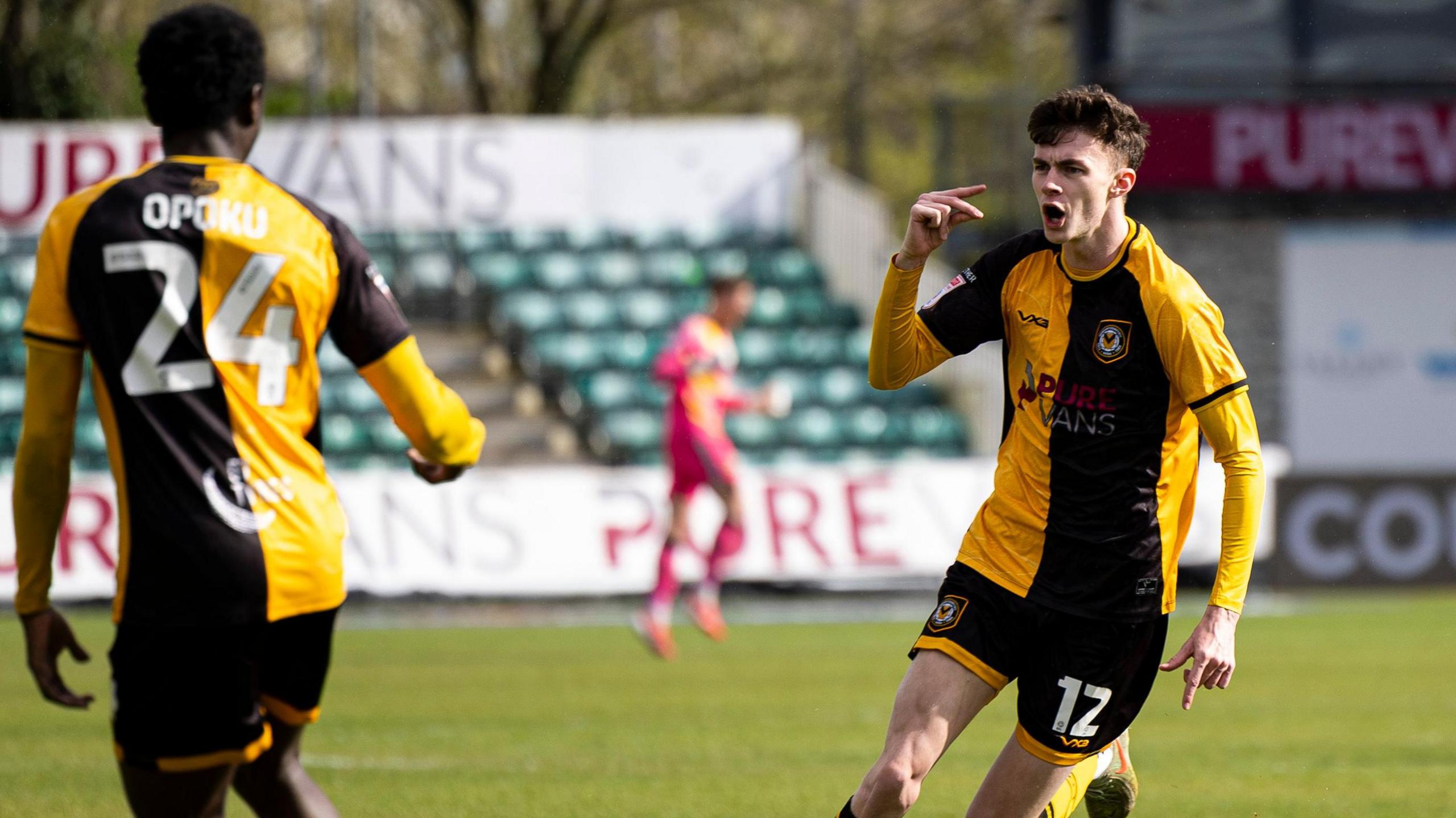 Joe Thomas celebrates after scoring against Harrogate
