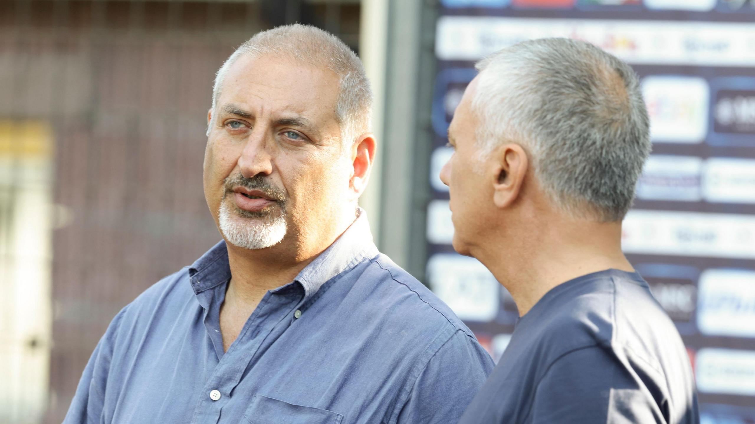 Napoli scouting manager Maurizio Micheli (left) talks to the Napoli's sport director Mauro Meluso
