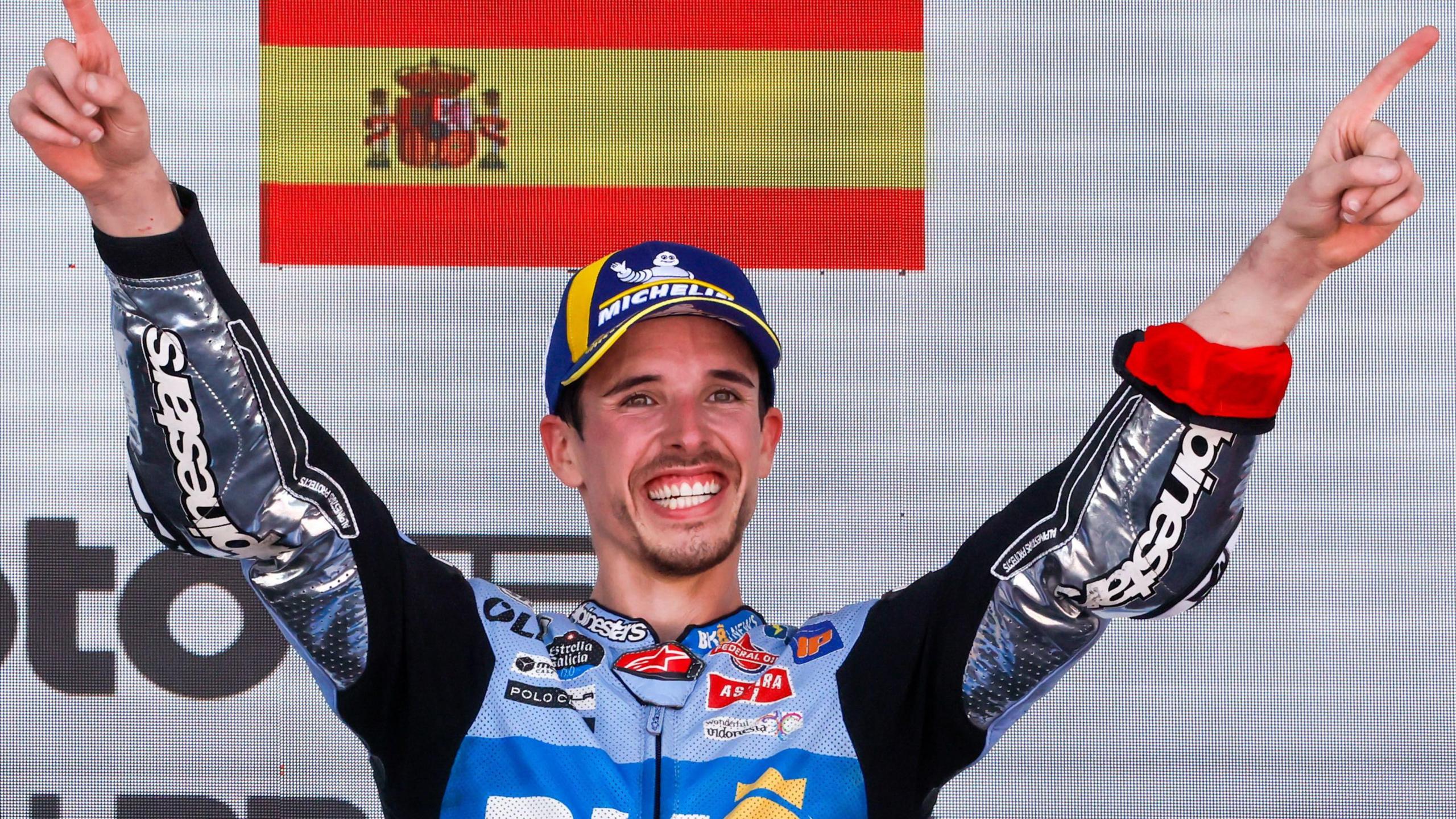 MotoGP rider Alex Marquez holds his arms aloft after winning the 2025 Spanish Grand Prix