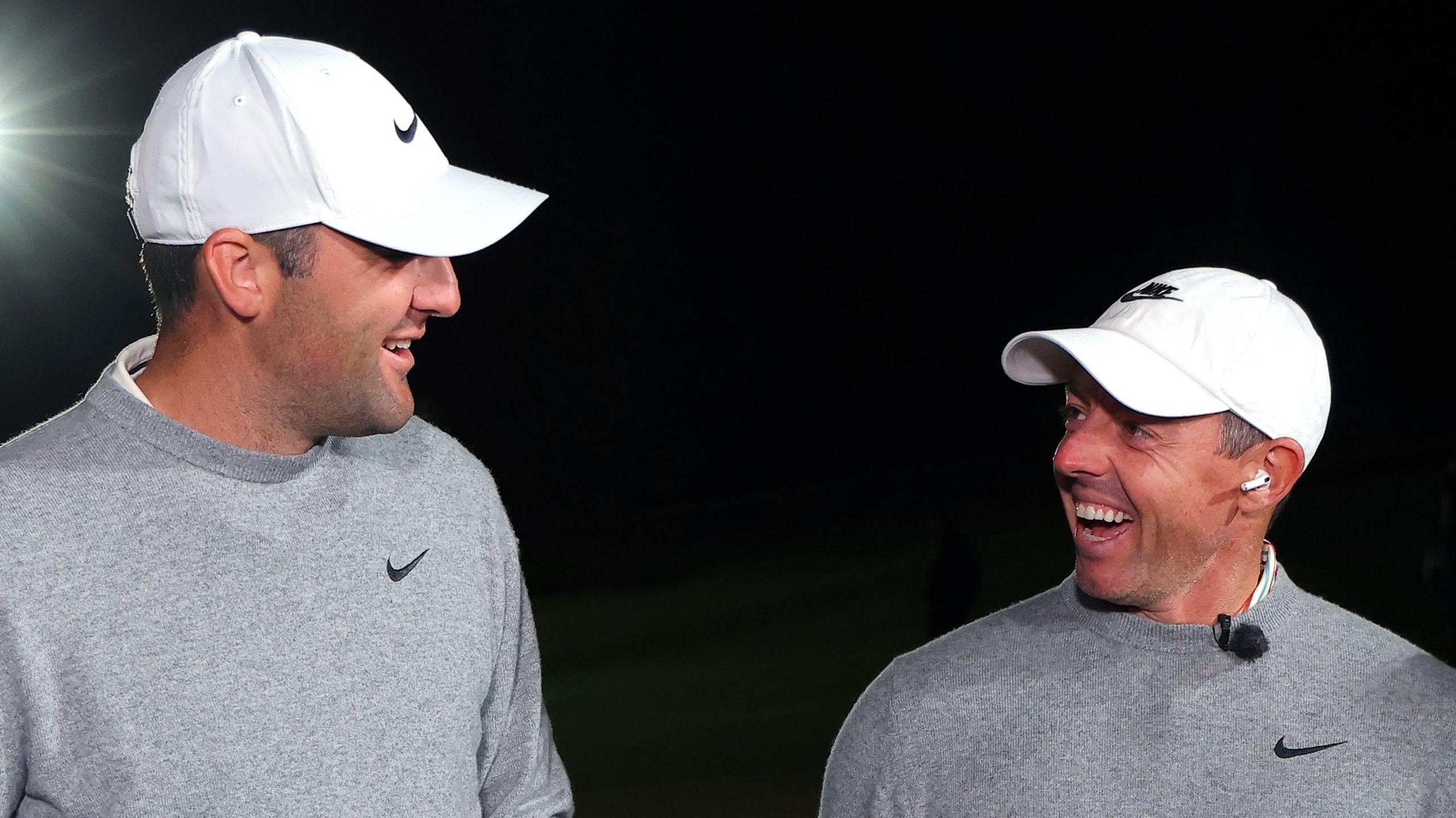 Scottie Scheffler and Rory McIlroy celebrate winning 'The Showdown'