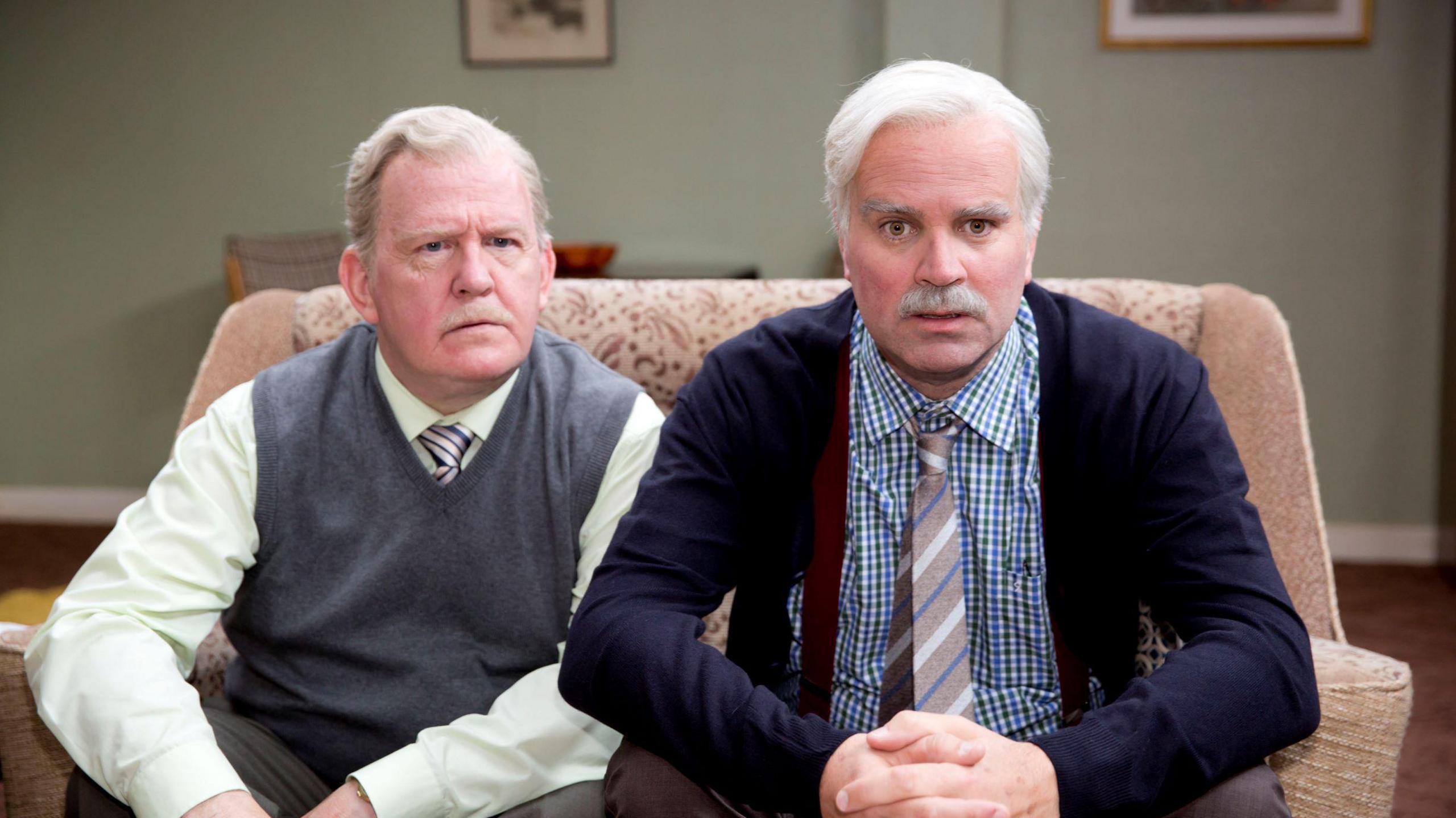 Ford Kiernan and Greg Hemphill as Jack and Victor in Still Game - both are dressed as pensioners with white hair and are looking into the camera