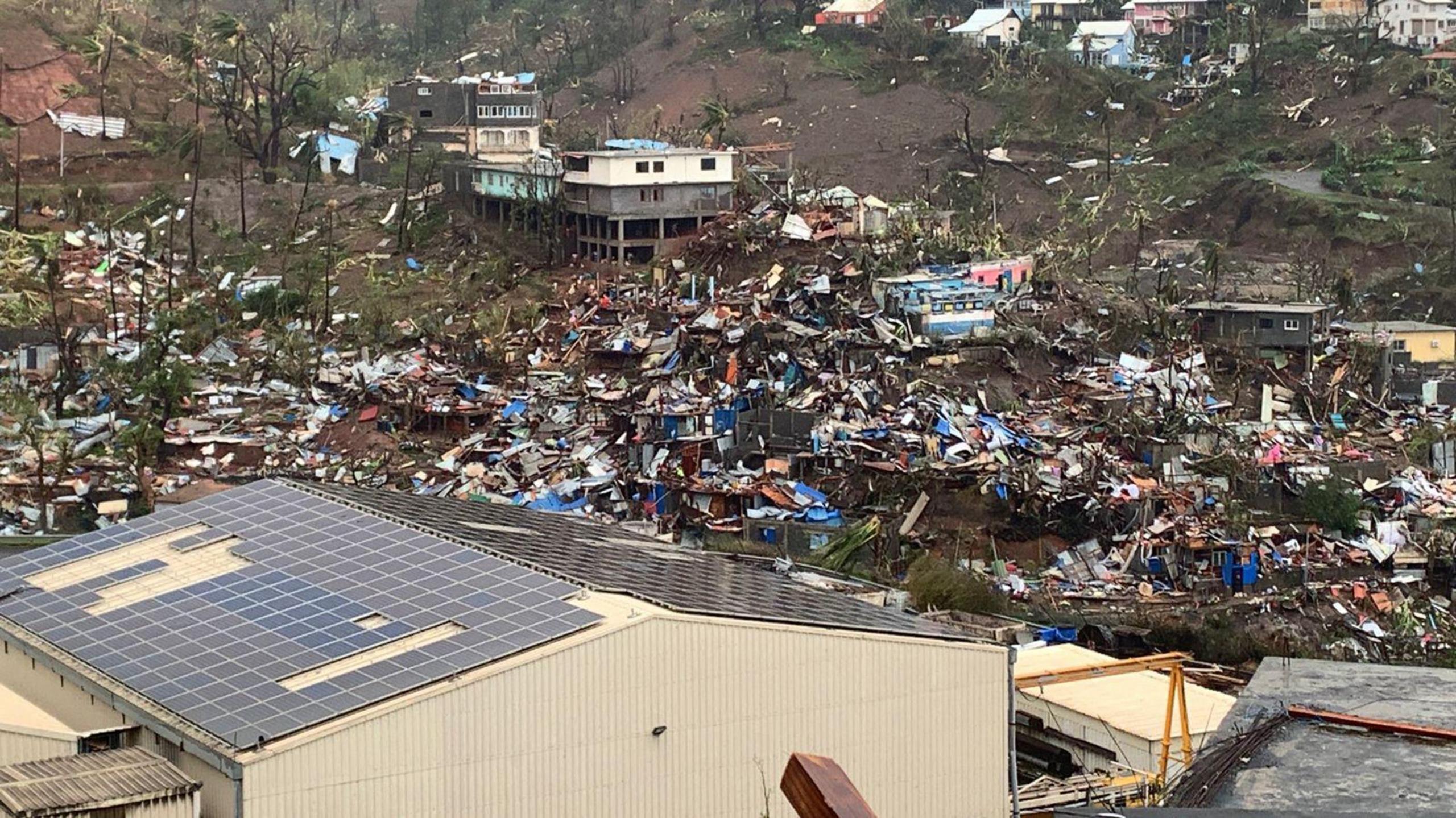 Metal sheets, wood, furniture and belongings after the cyclone Chido hit France's Indian Ocean territory of Mayotte, 15 December 2024. 