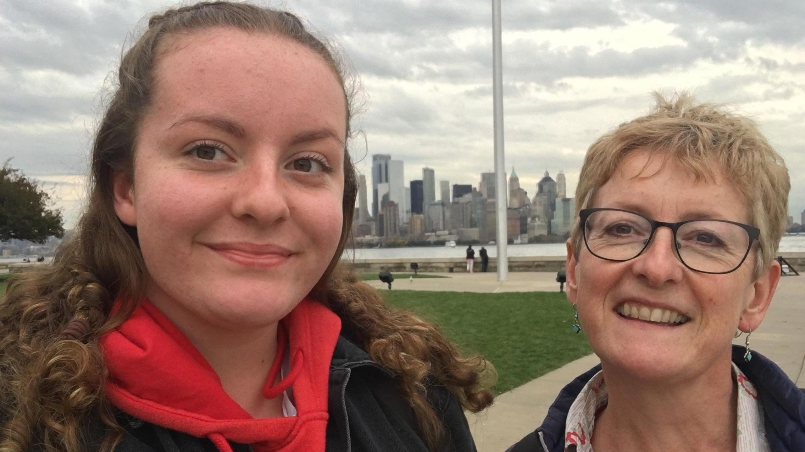 Naomi Barlow, left, is wearing a black coat and Rachel is right.