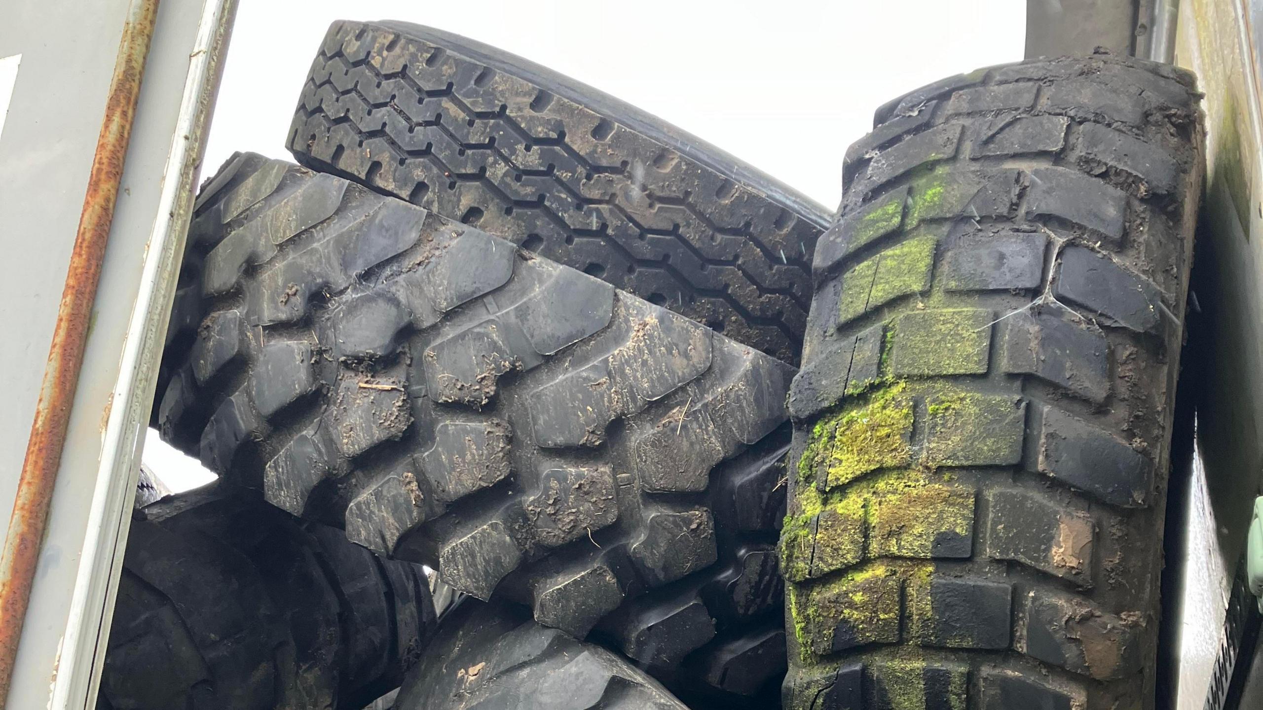 Some of the tyres left in the lorry trailer