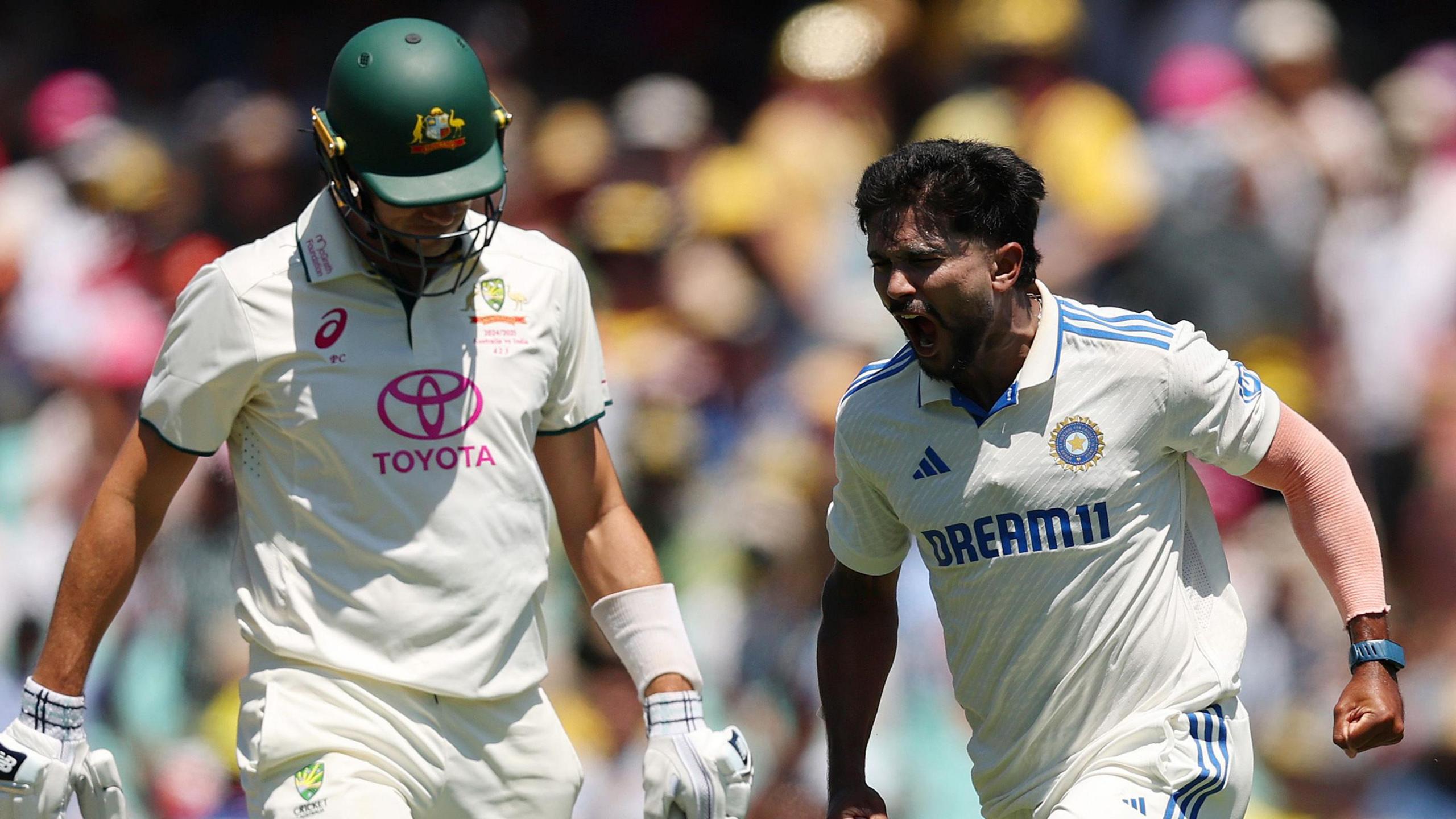 India's Nitish Kumar Reddy celebrates after dismissing Australia captain Pat Cummins in a Test in 2025