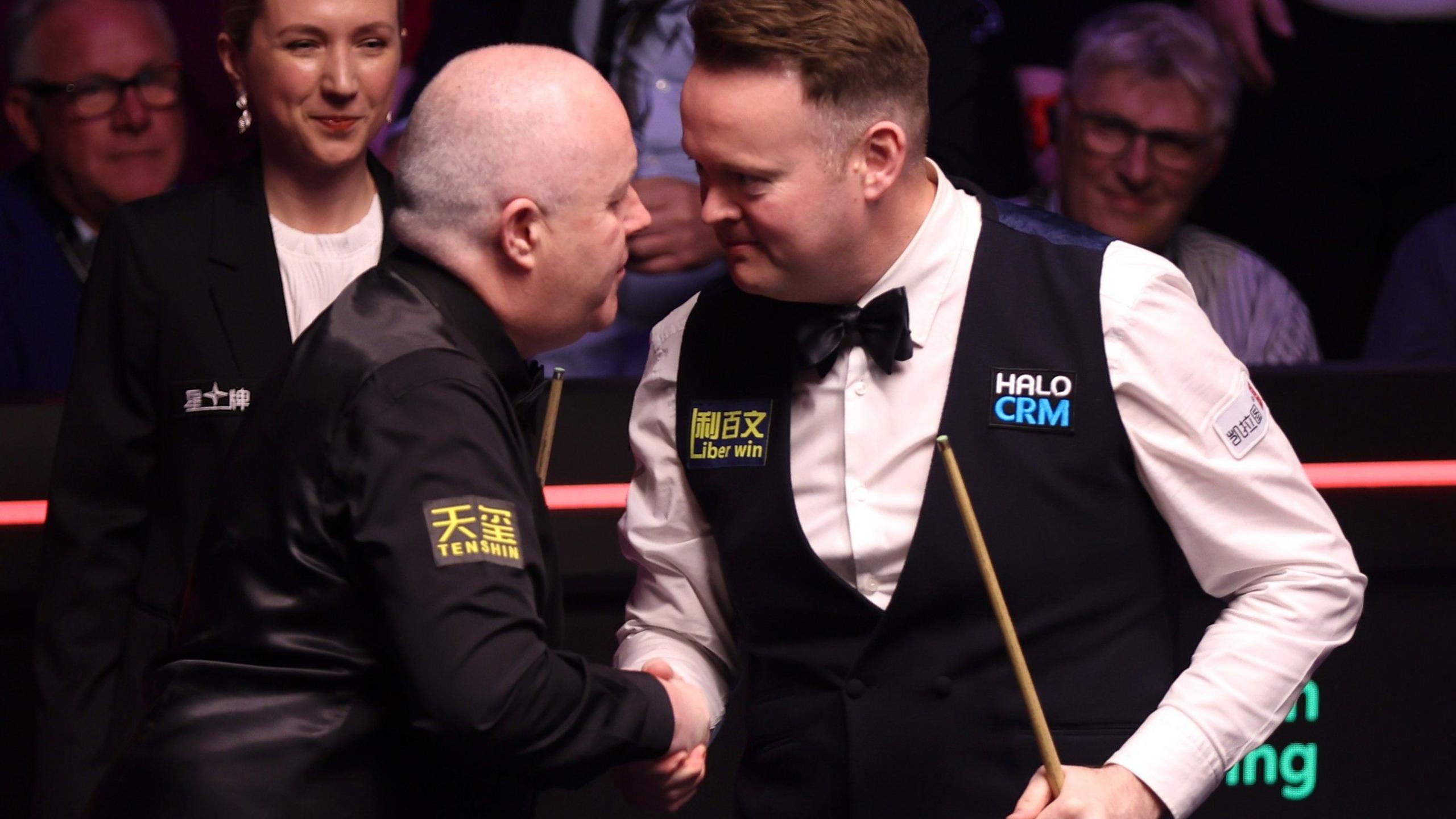 John Higgins congratulates Shaun Murphy