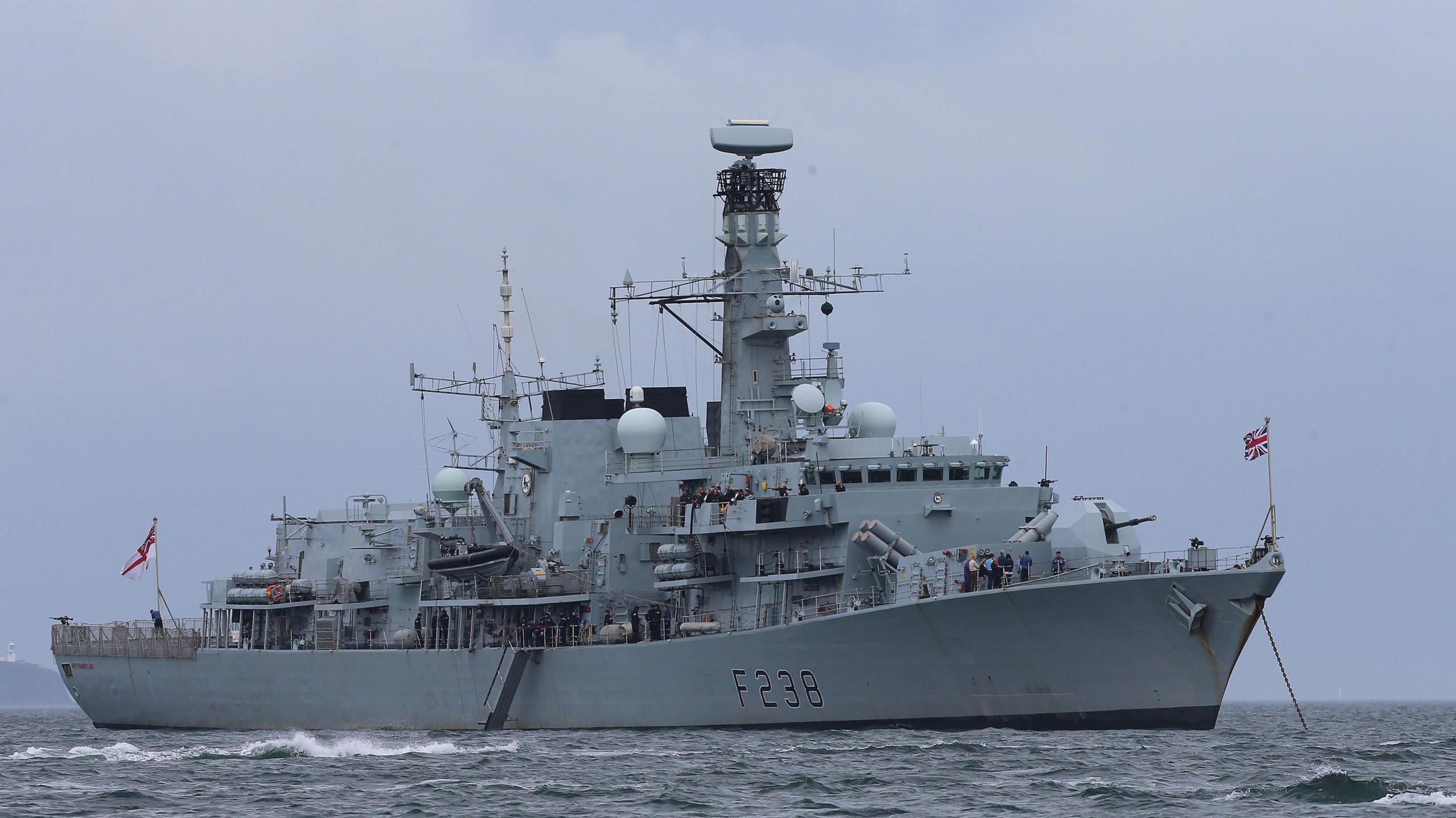 HMS Northumberland, a large grey navy ship, at sea, location unconfirmed, 2015.