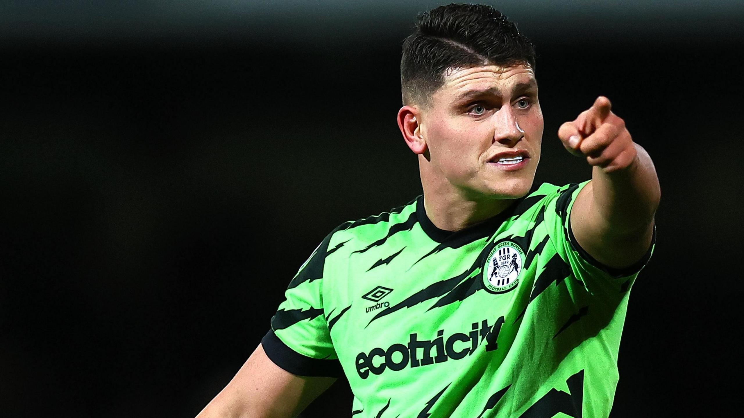 Matty Stevens points to a team-mate while playing for Forest Green