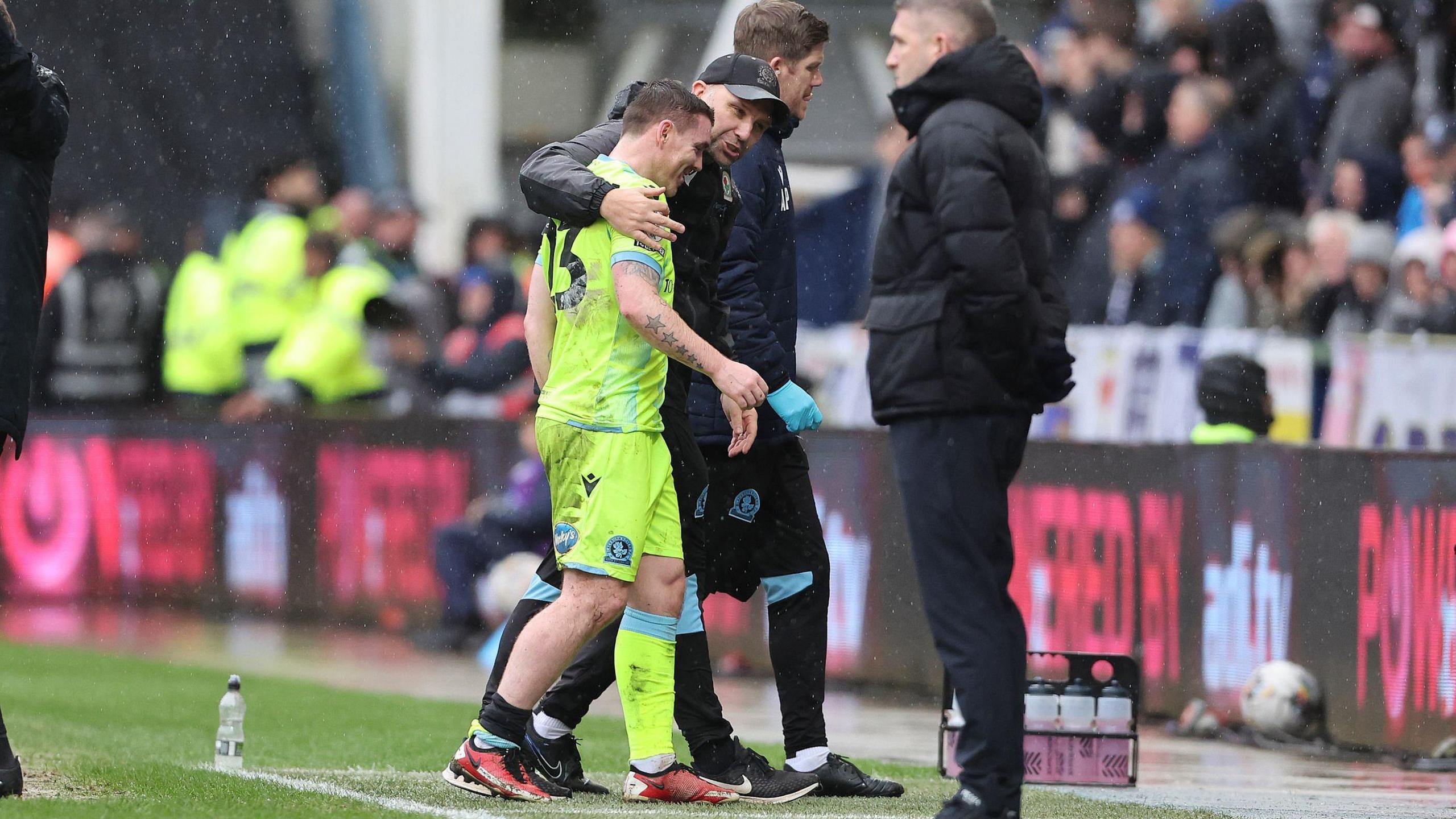 John Fleck limps off injured