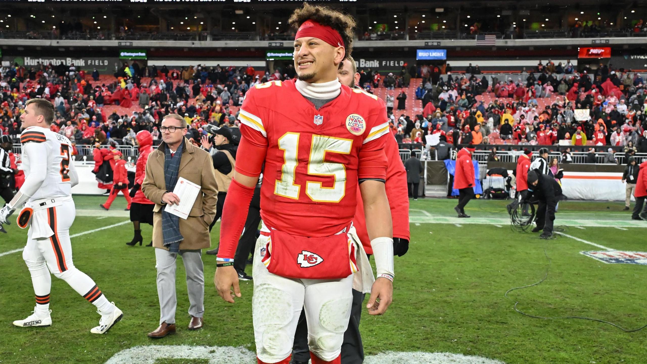 Kansas City Chiefs quarterback Patrick Mahomes grimaces with pain as he walks off the field in Cleveland