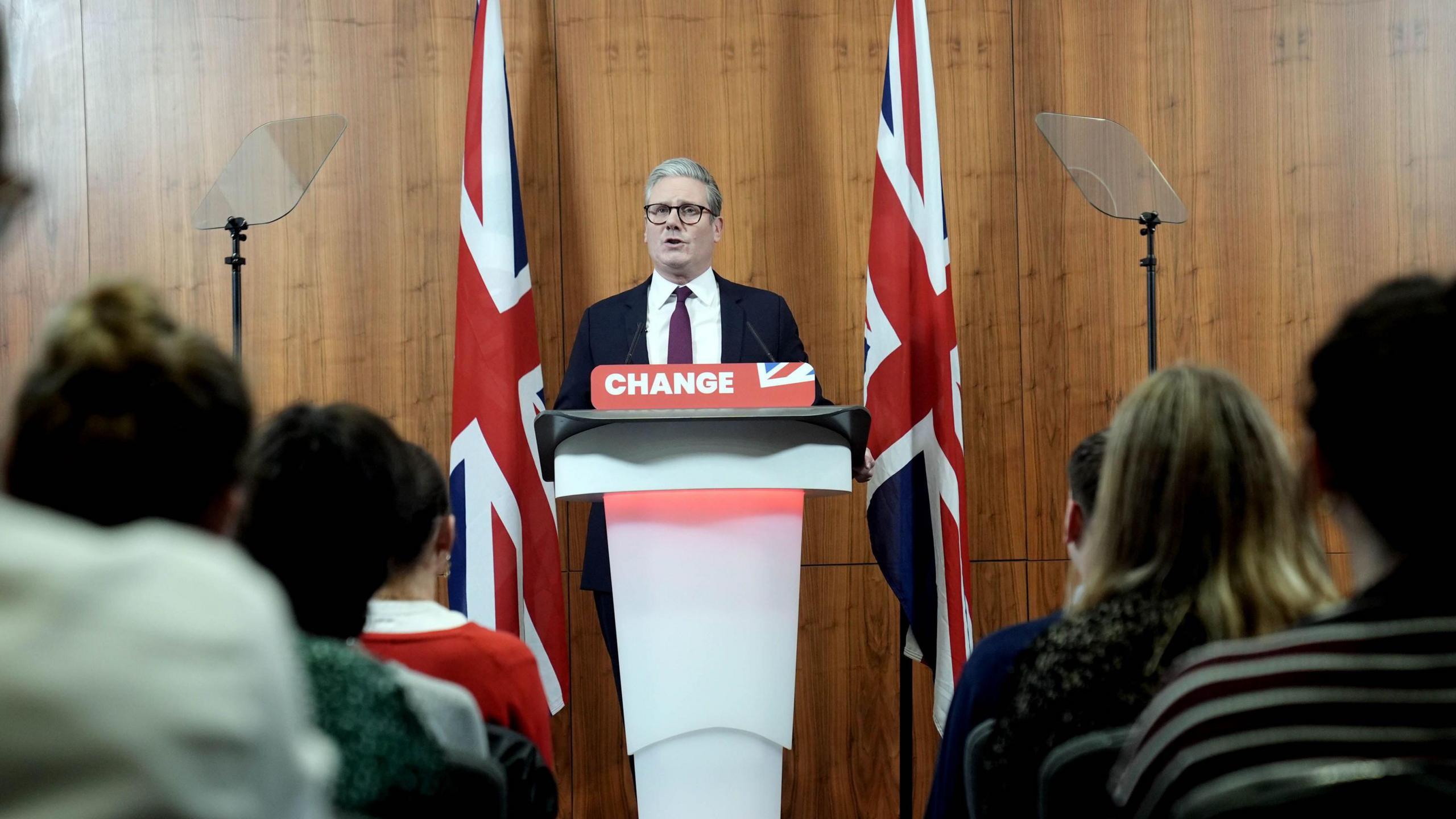 Keir Starmer at a lectern responding to the general election announcement