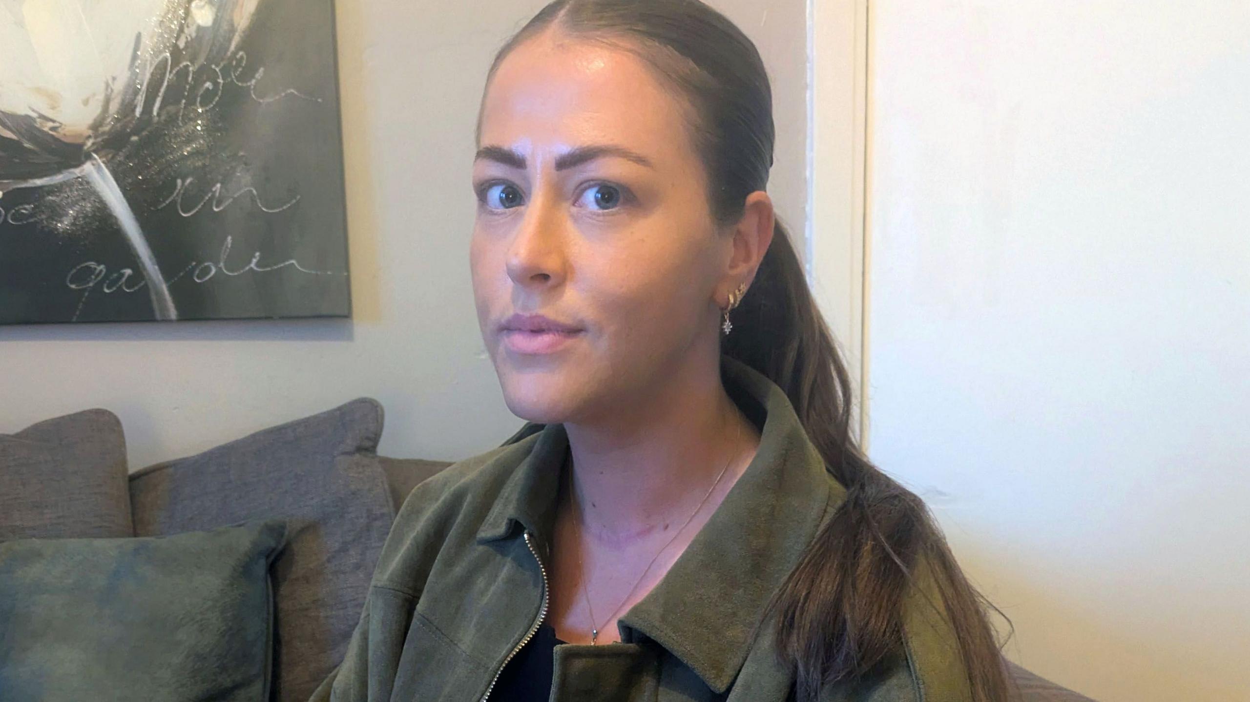 A photo of Nadia in her living room