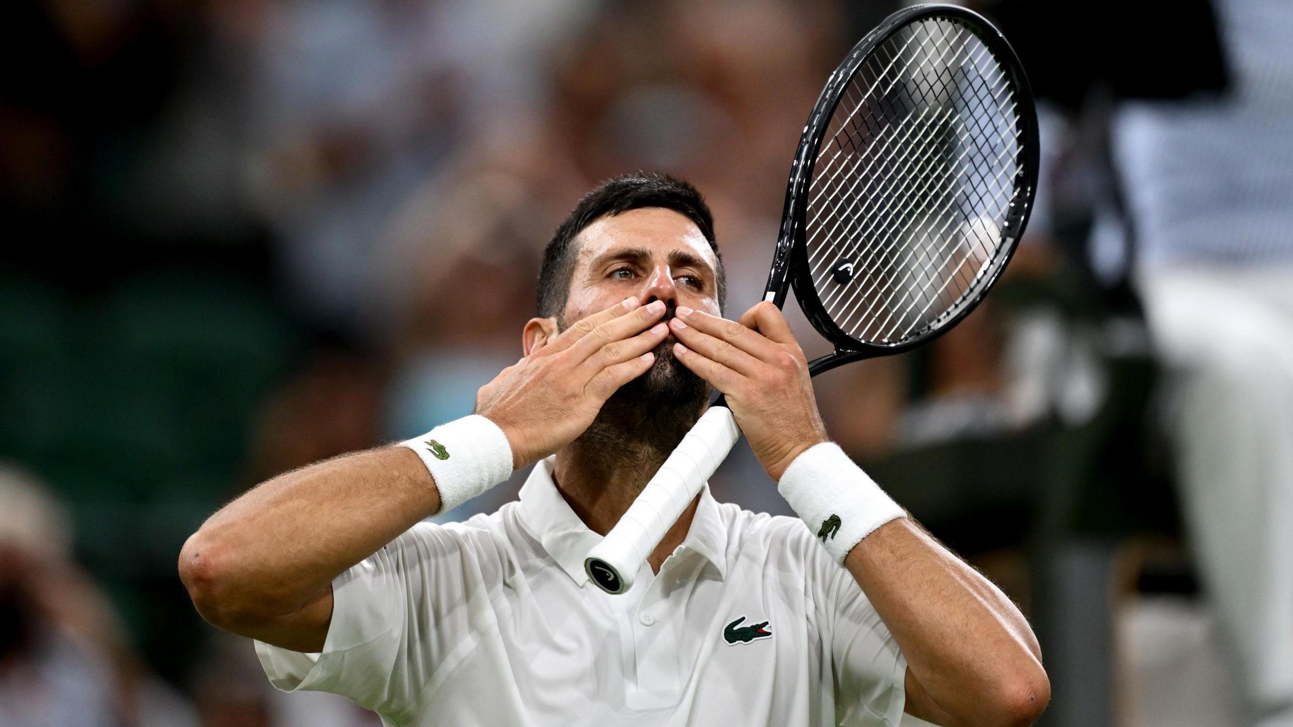Novak Djokovic thanks the crowd after his victory 