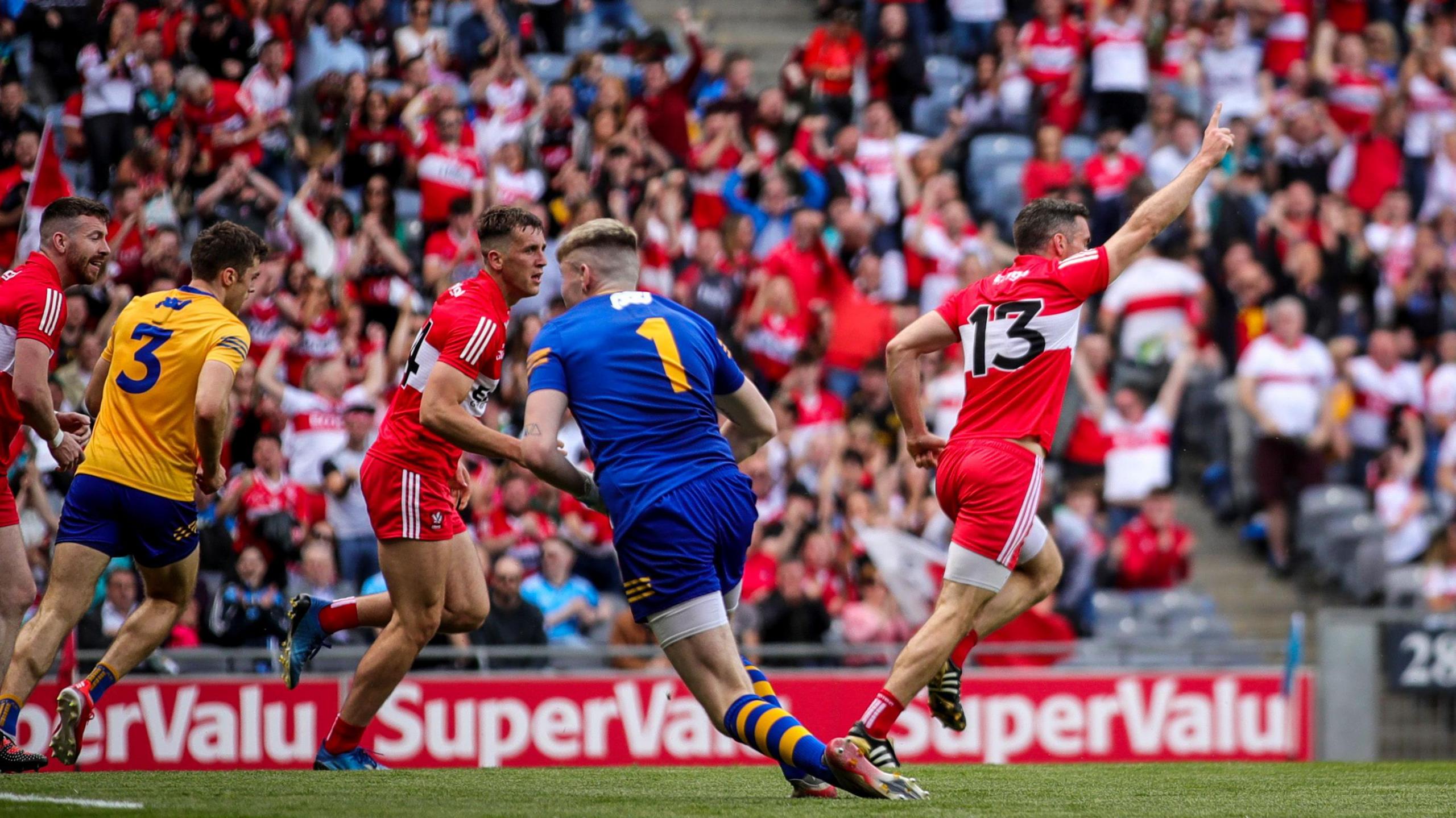 Heron celebrates scoring against Clare in 2022