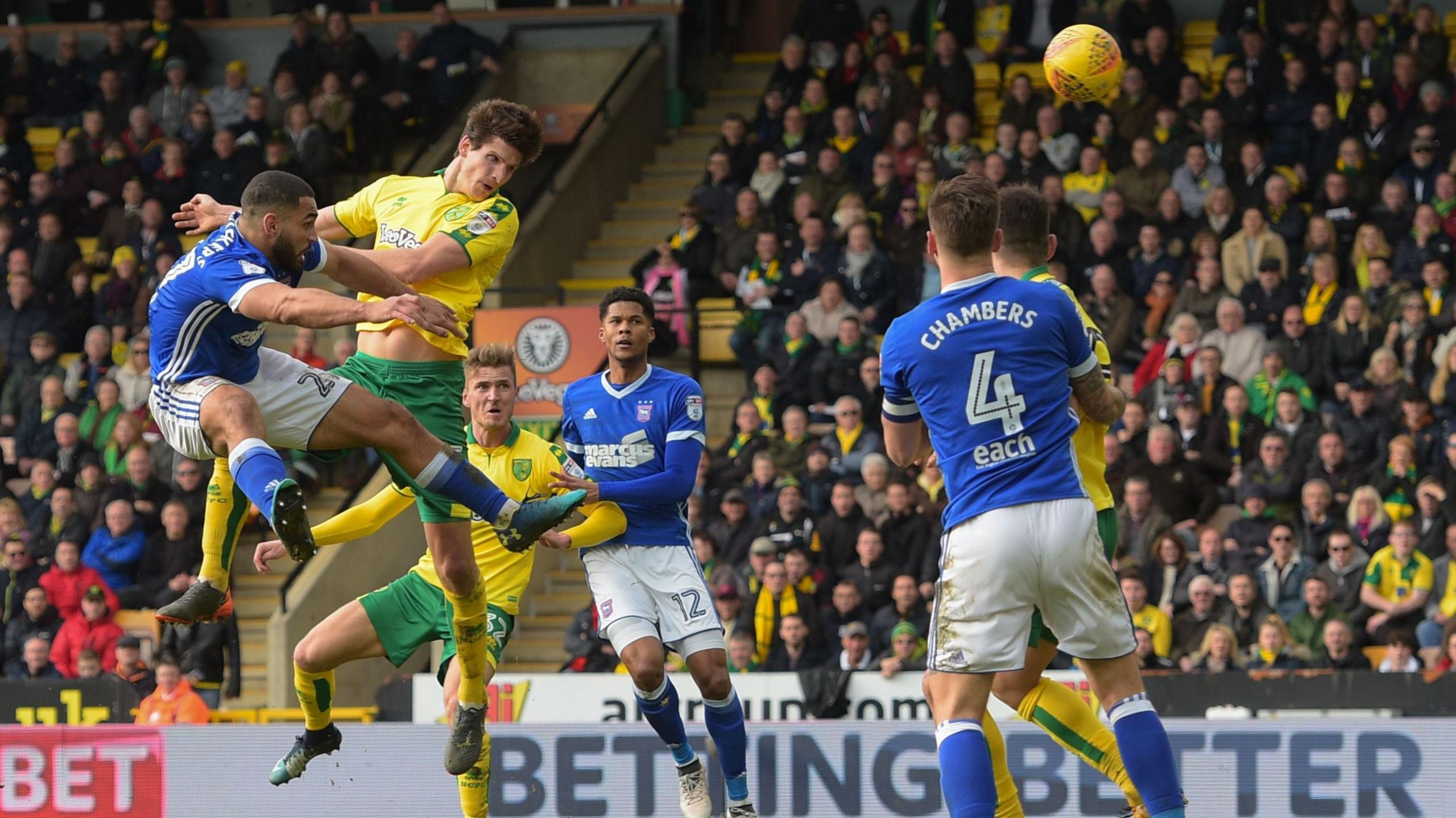 Norwich's Timm Klose (second left) heads a late equaliser to deny Ipswich victory at Carrow Road in February 2018
