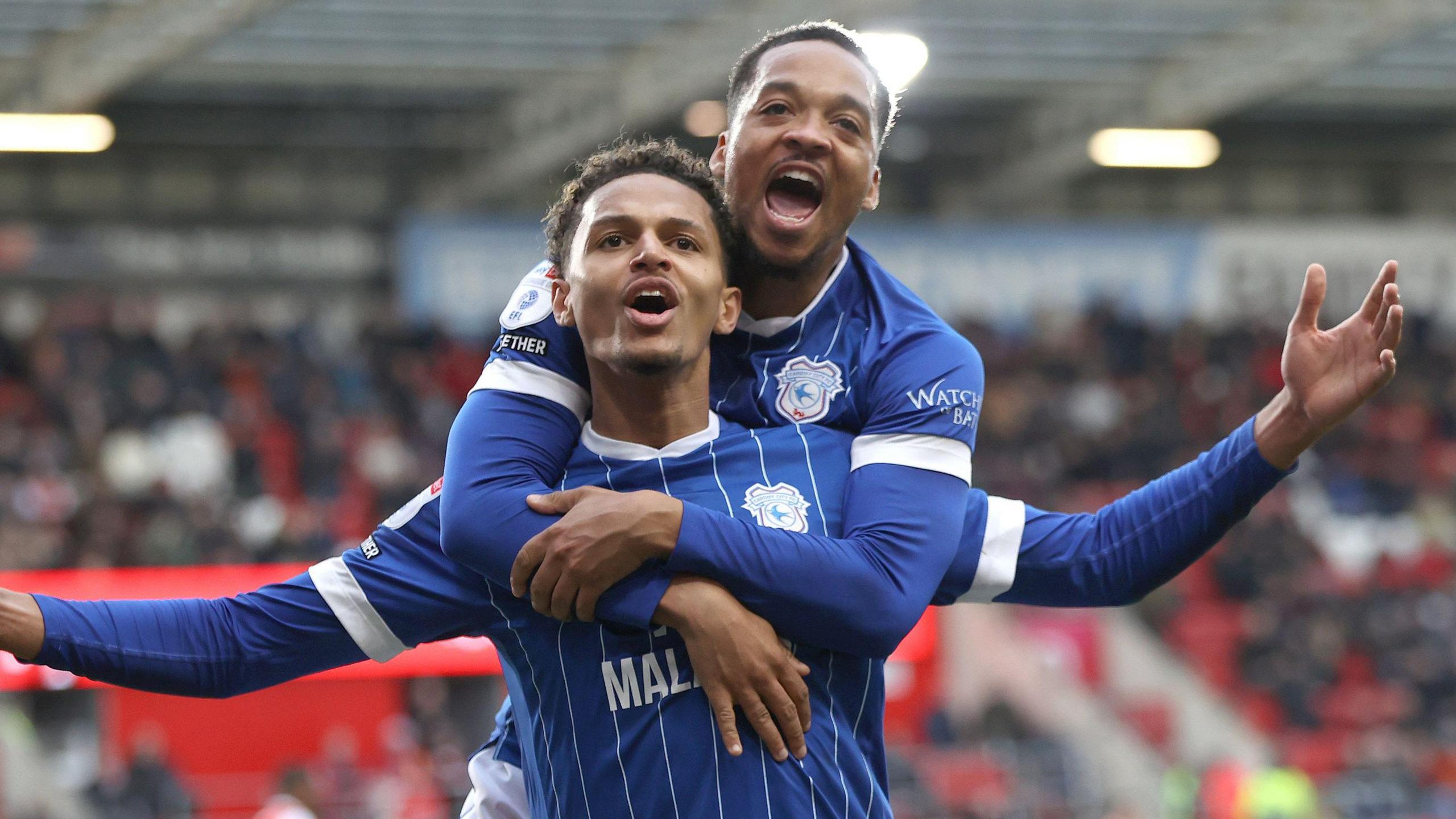 Omari Kellyman of Cardiff celebrates scoring the 1st goal of the match with Chris Willock 