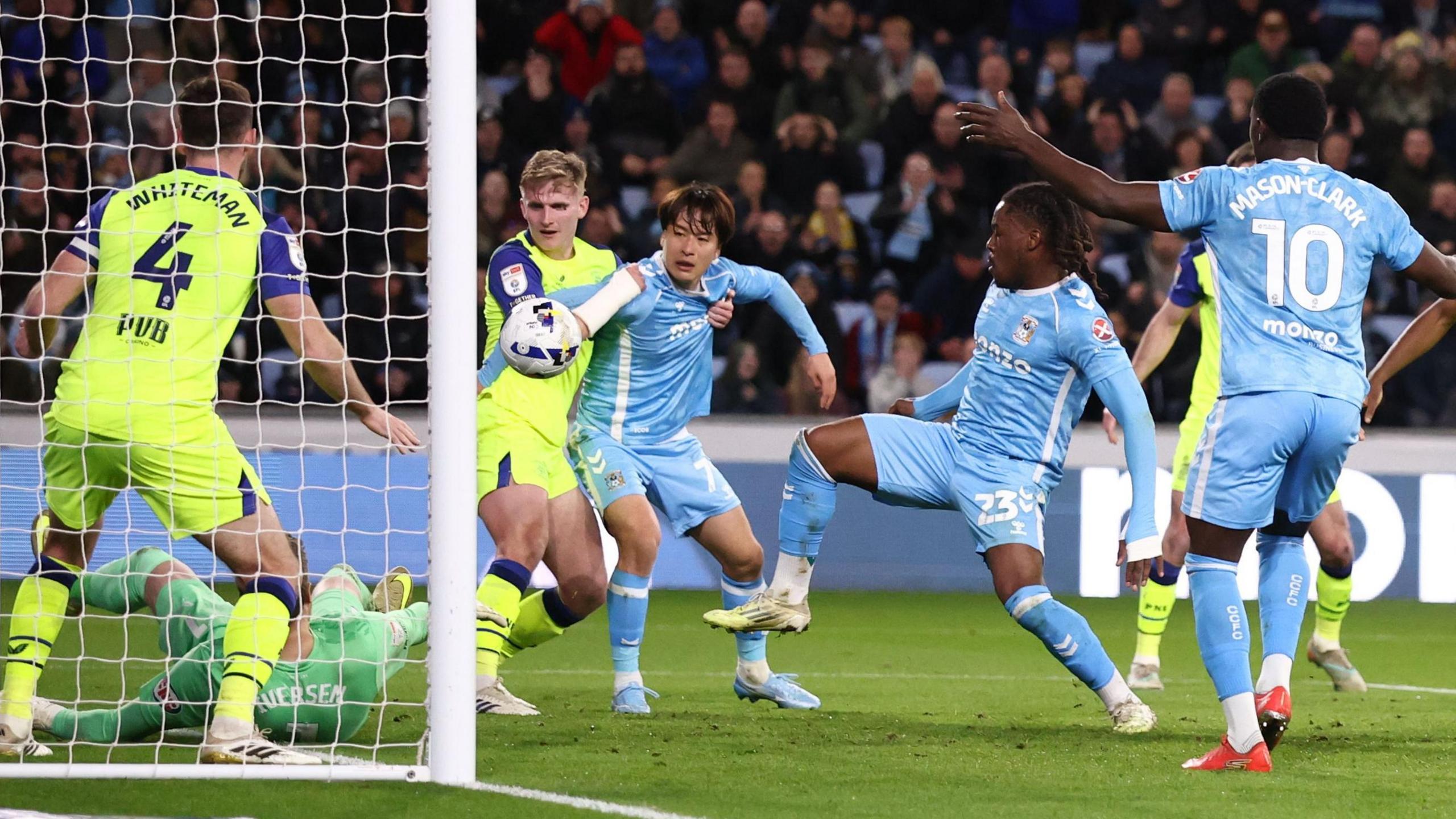 Coventry City's Brandon Thomas-Asante, from close range, converts via his chest with Preston goalkeeper Daniel Iversen prone on the ground