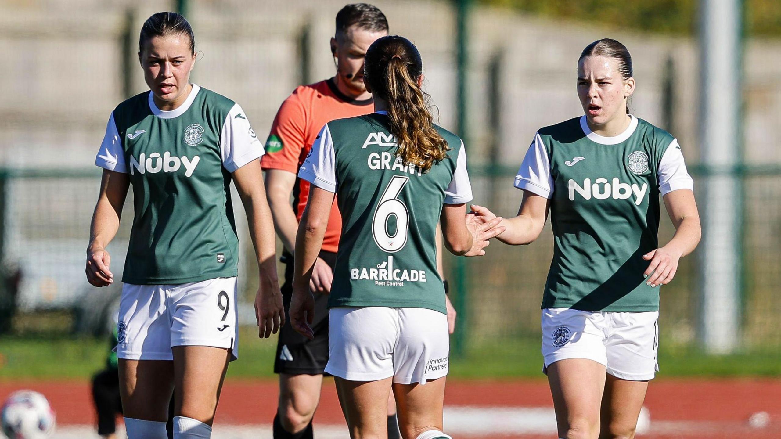 Hibernian women players celebrate