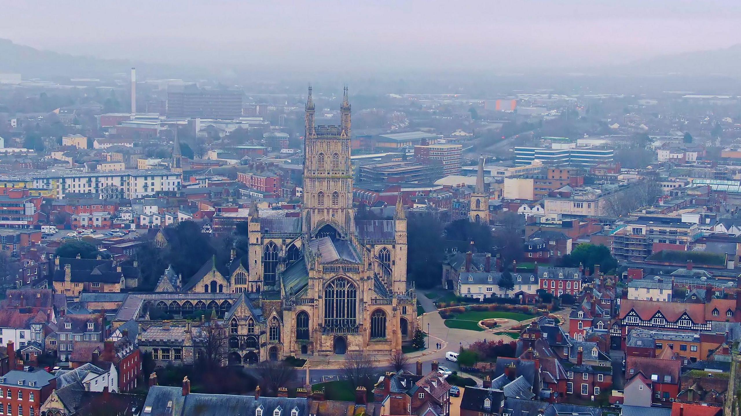 A view of Gloucester from above. Gloucester Cathedral can be seen in the centre.