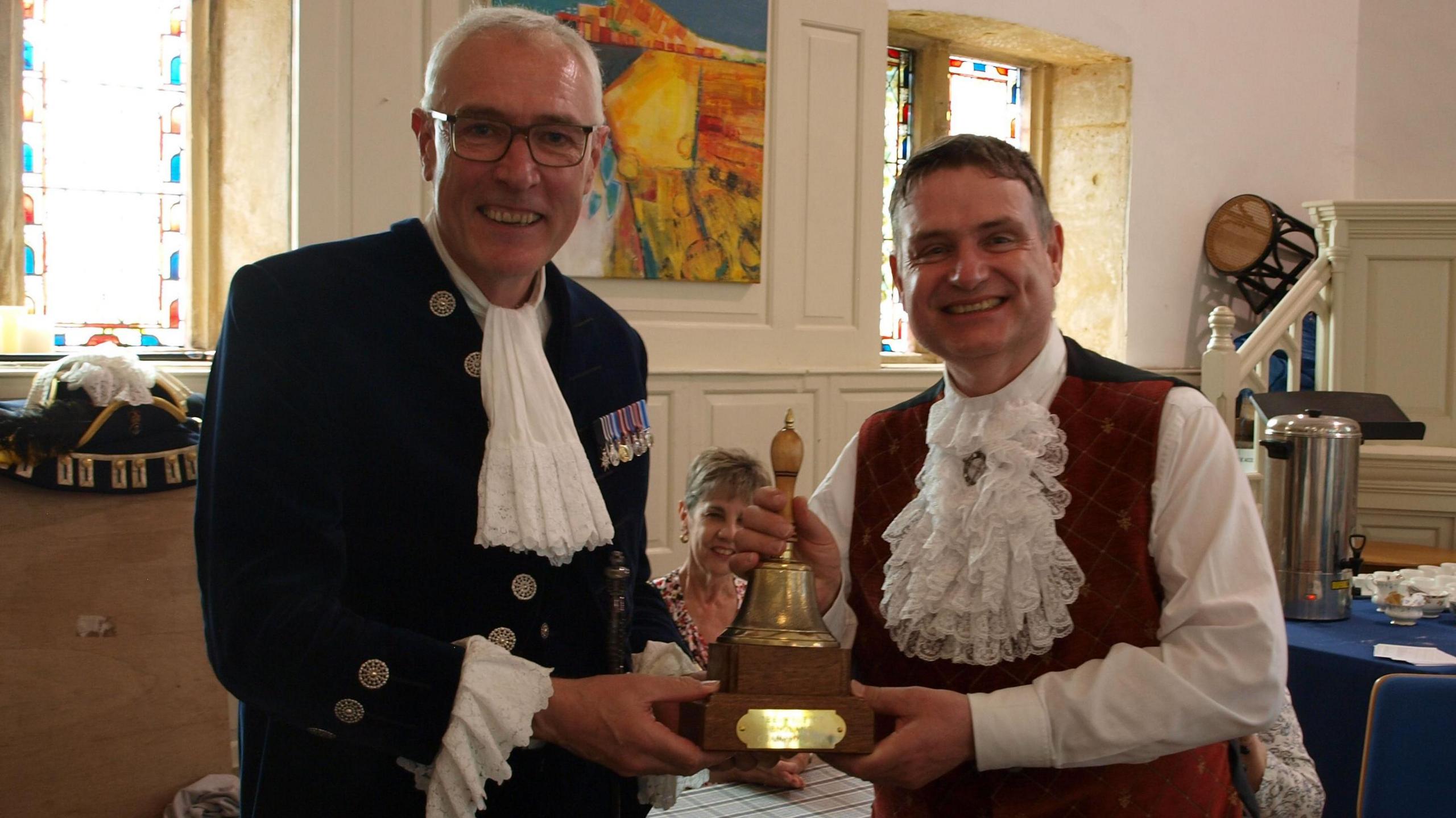 Image of Mark Wylie collecting his trophy