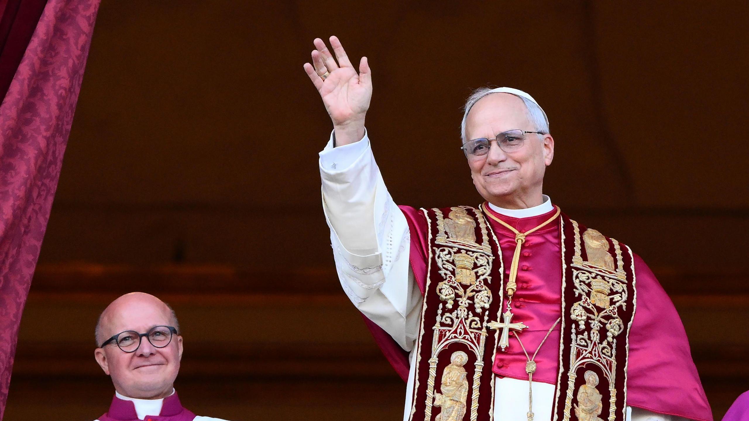 Newly elected Pope Leo XIV, Cardinal Robert Francis Prevost from the USA, greets faithfuls from the central loggia of Saint Peter's Basilica, Vatican City