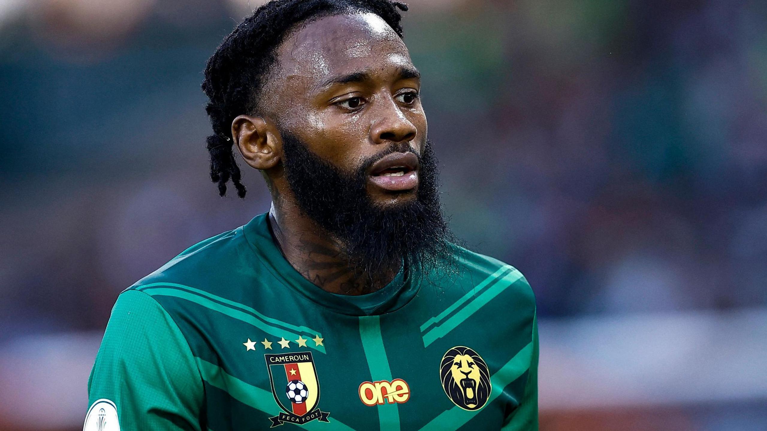 Georges-Kevin Nkoudou wearing a green Cameroon shirt during a match