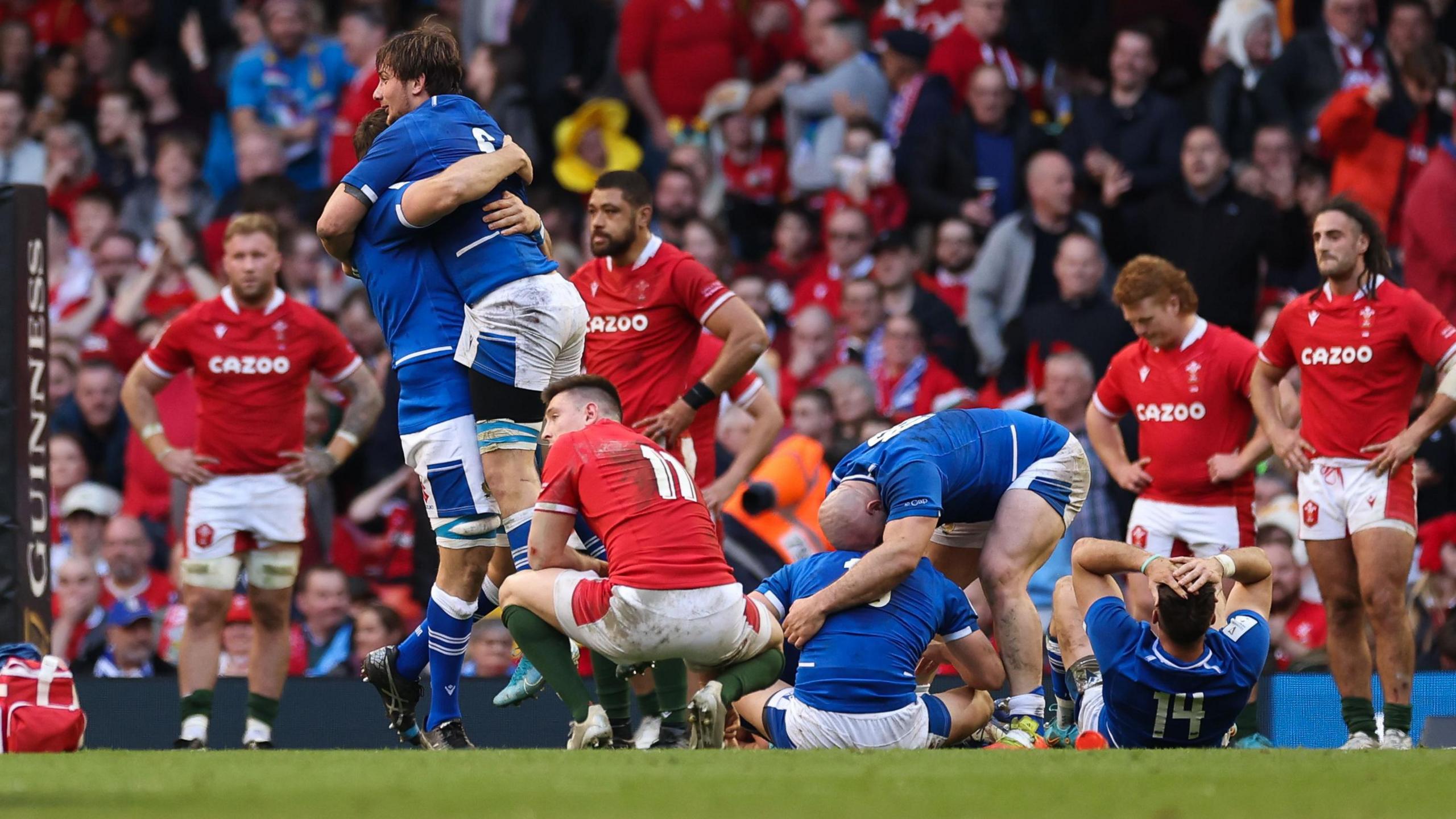 Italy celebrate victory against Wales in Cardiff in March 2022