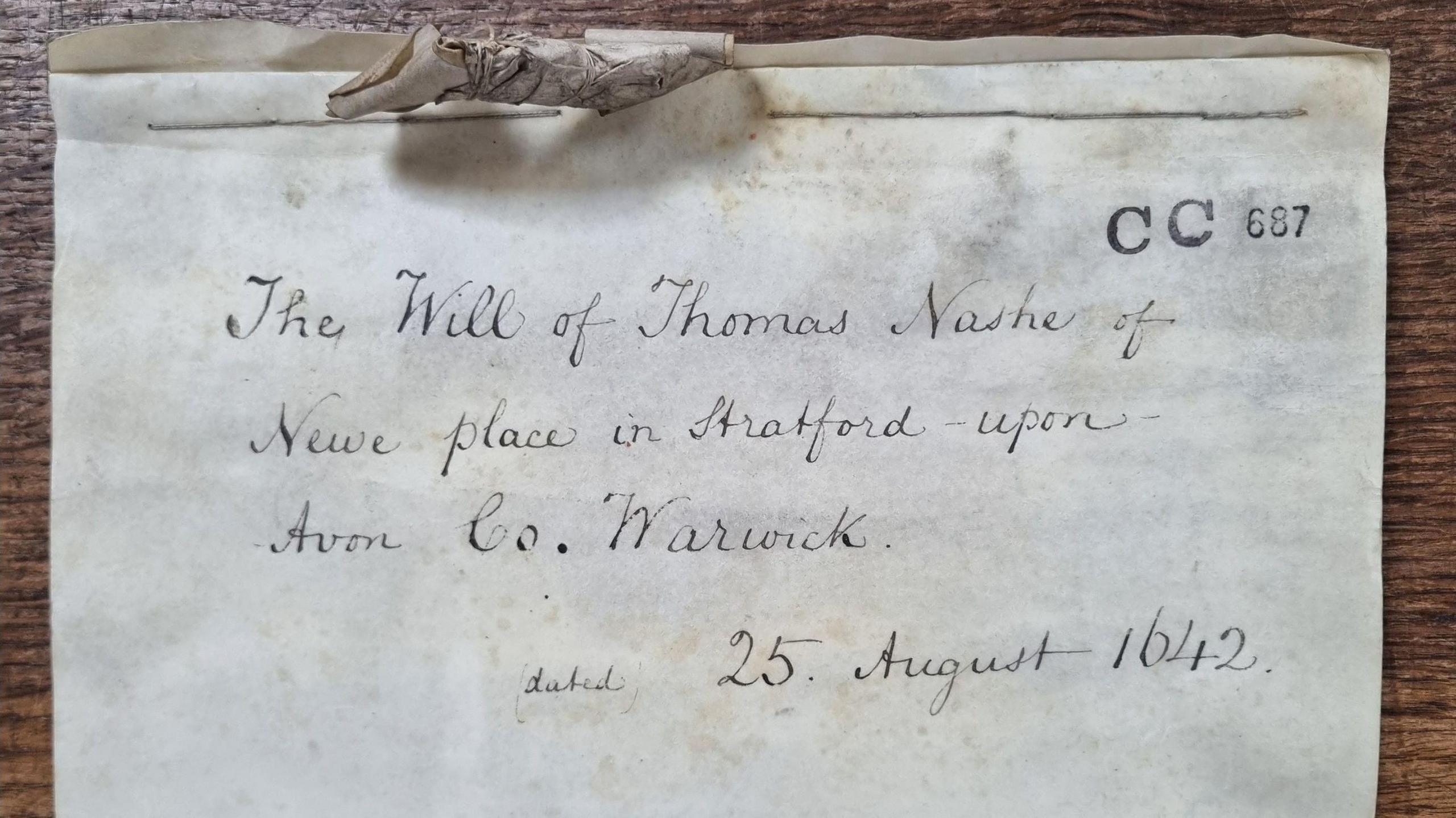 A piece of paper with the words "The will of Thomas Nashe of Newe place in Stratford-upon-Avon Warwick, 25 August 1642".