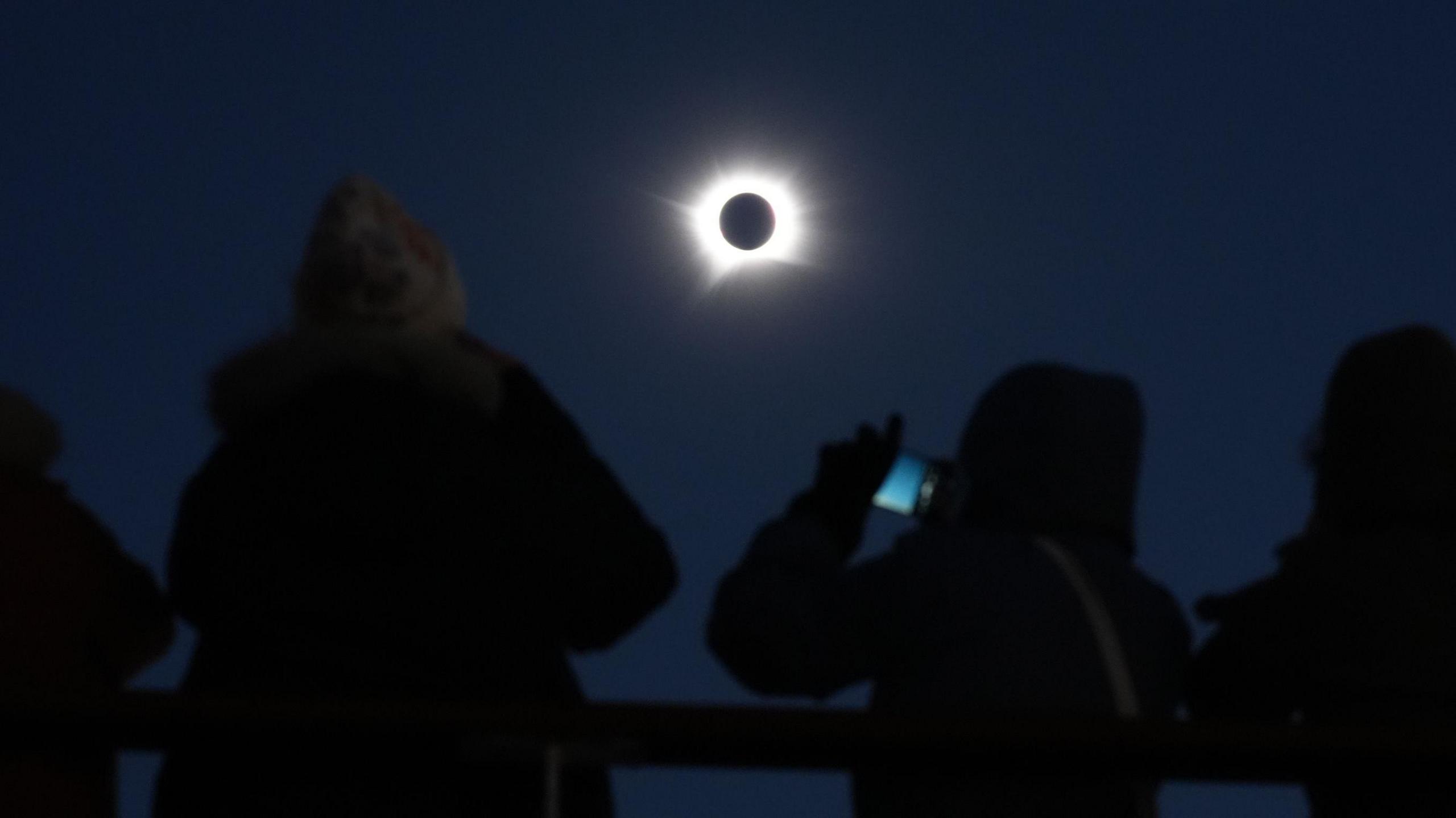 A view of the total eclipse, as the Moon passes between the Earth and the Sun, as seen from on board the Ambassador cruise ship Ambition, off the coast of Greenland.