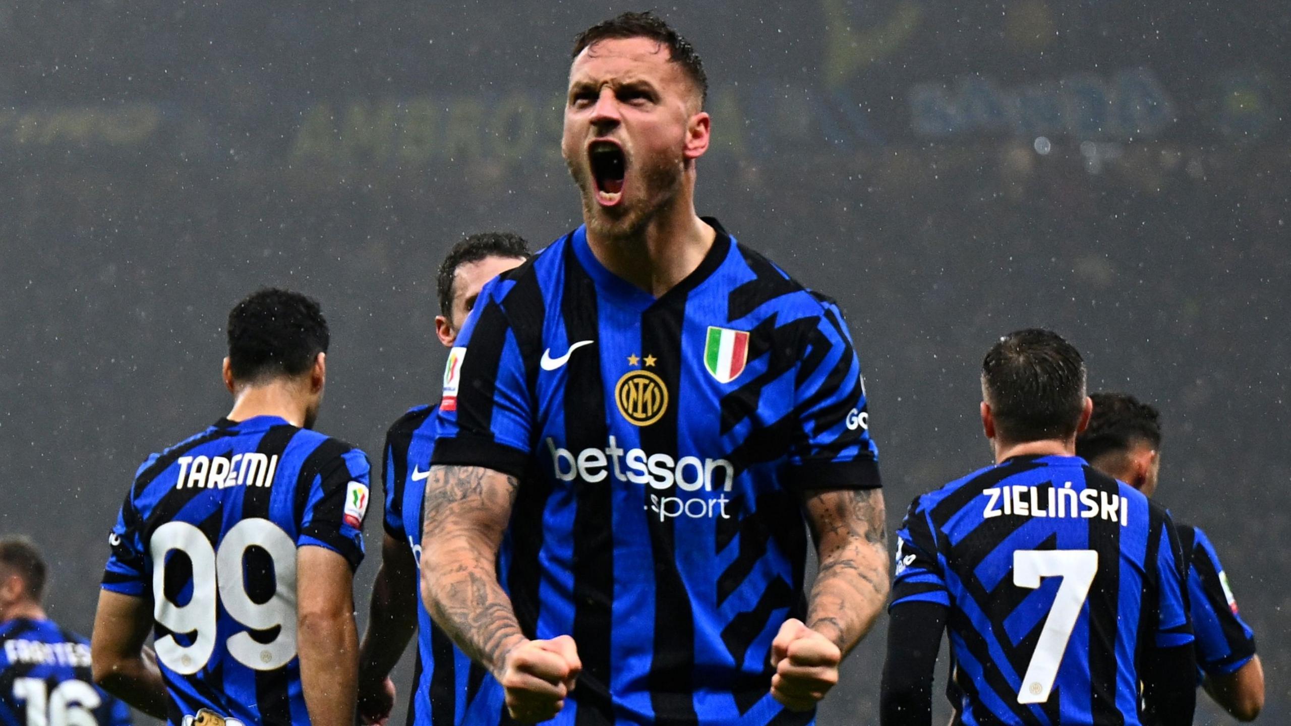 Marko Arnautovic of Inter Milan celebrates after scoring his team's opening goal during the Coppa Italia quarter-final match against Lazio. 