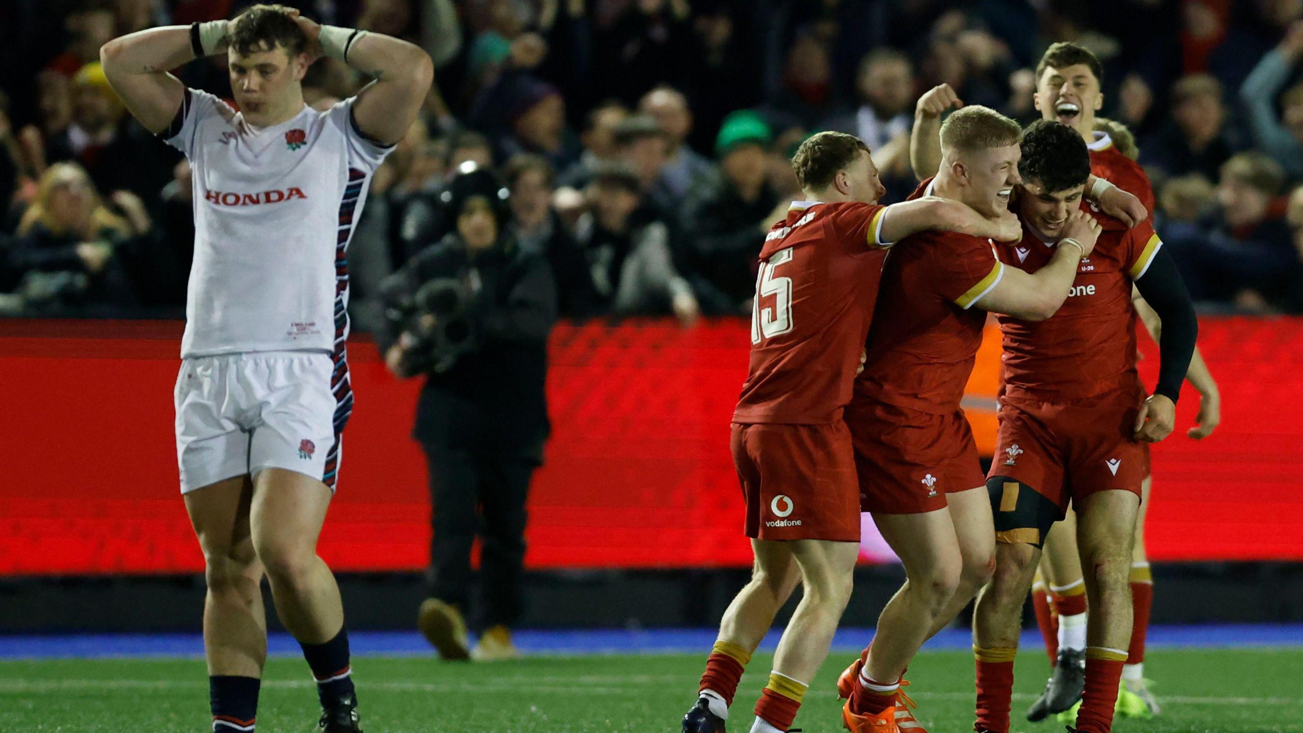 Wales players celebrate their victory over England