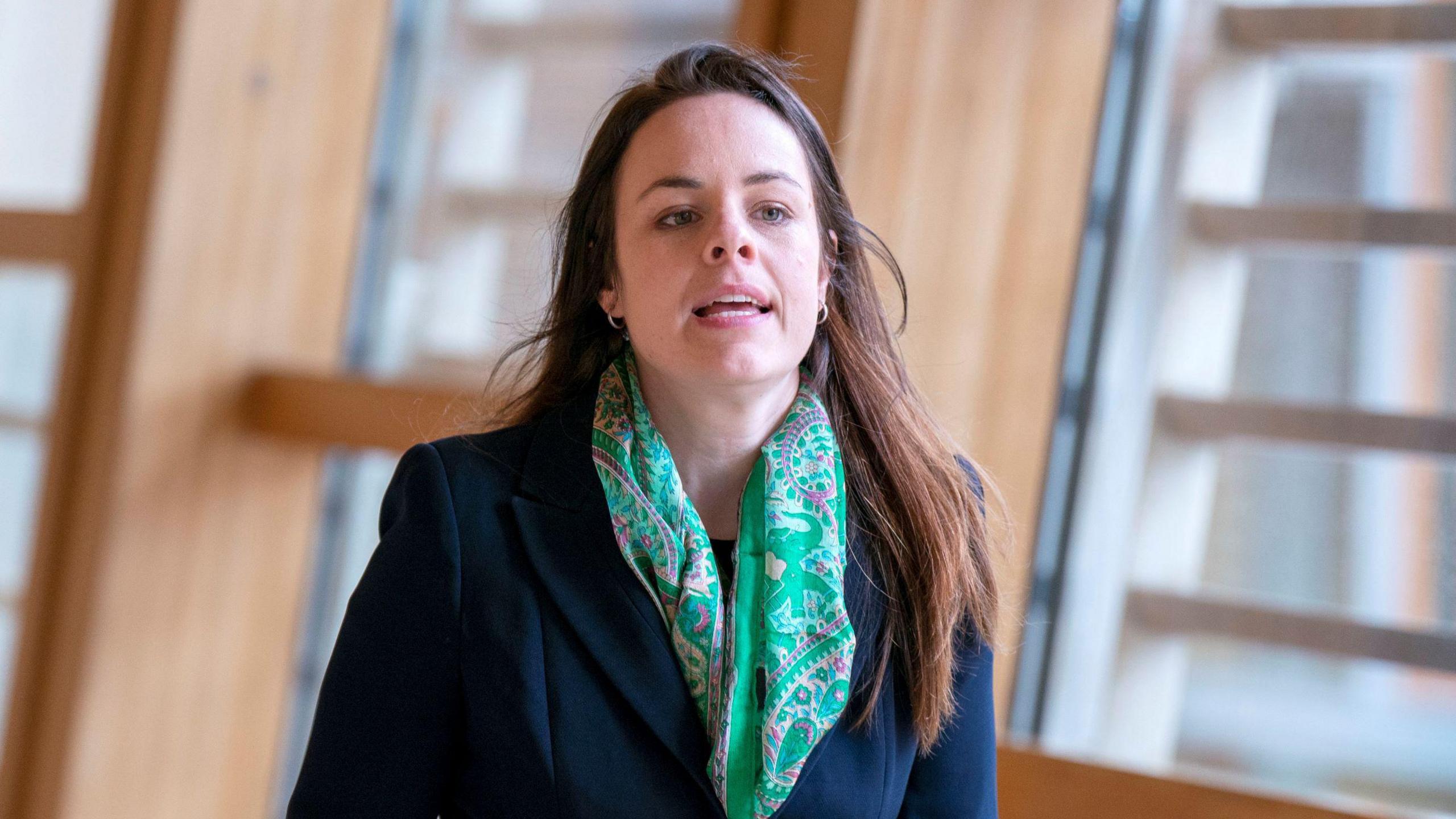 Kate Forbes walking in the Holyrood lobby