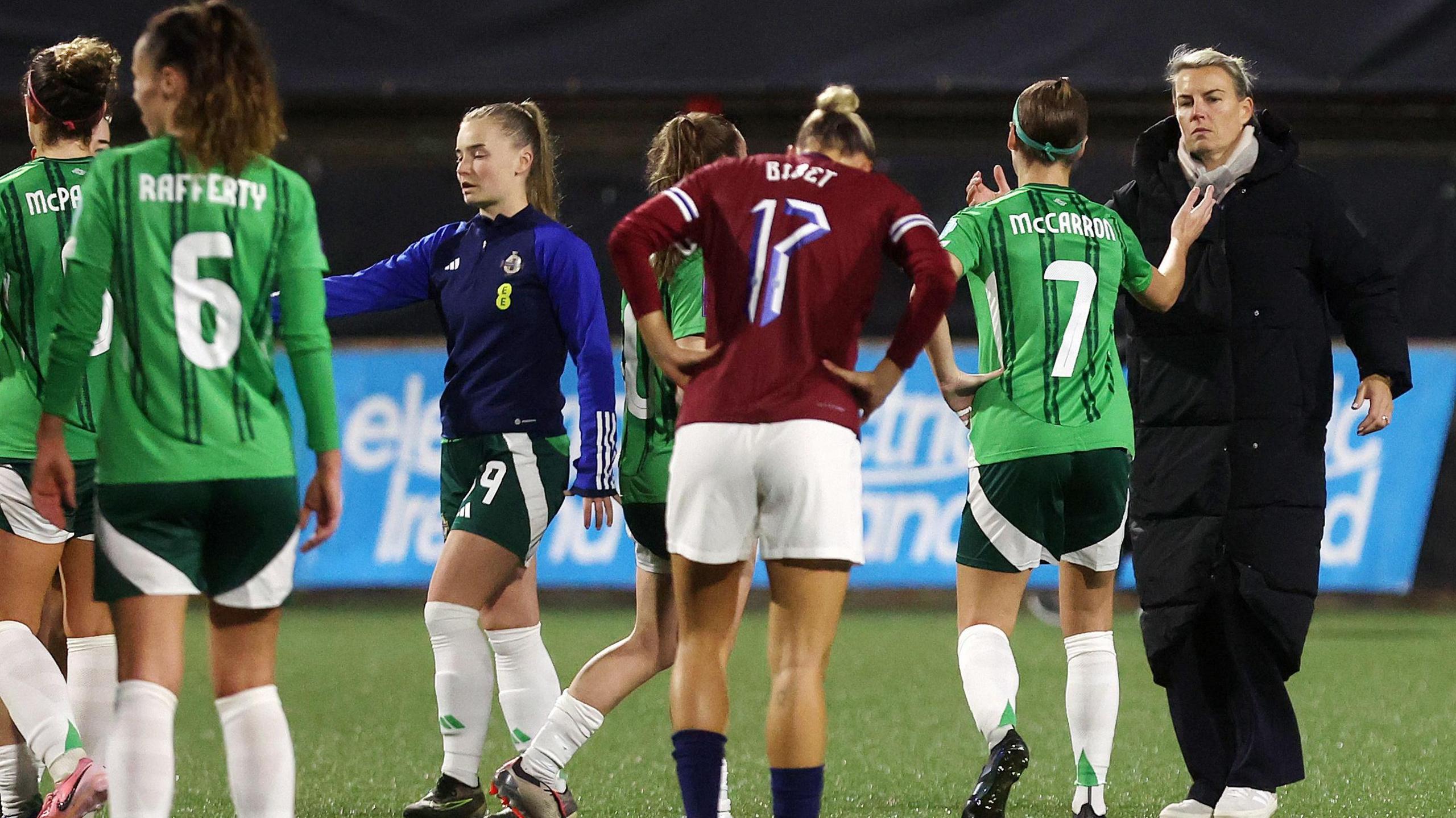 Tanya Oxtoby consoles her players after defeat against Norway