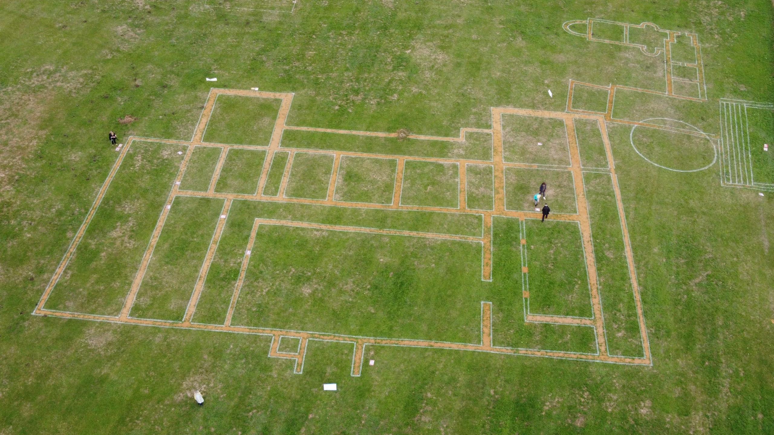 The site of a Roman villa in a park which is marked out by football pitch rollers