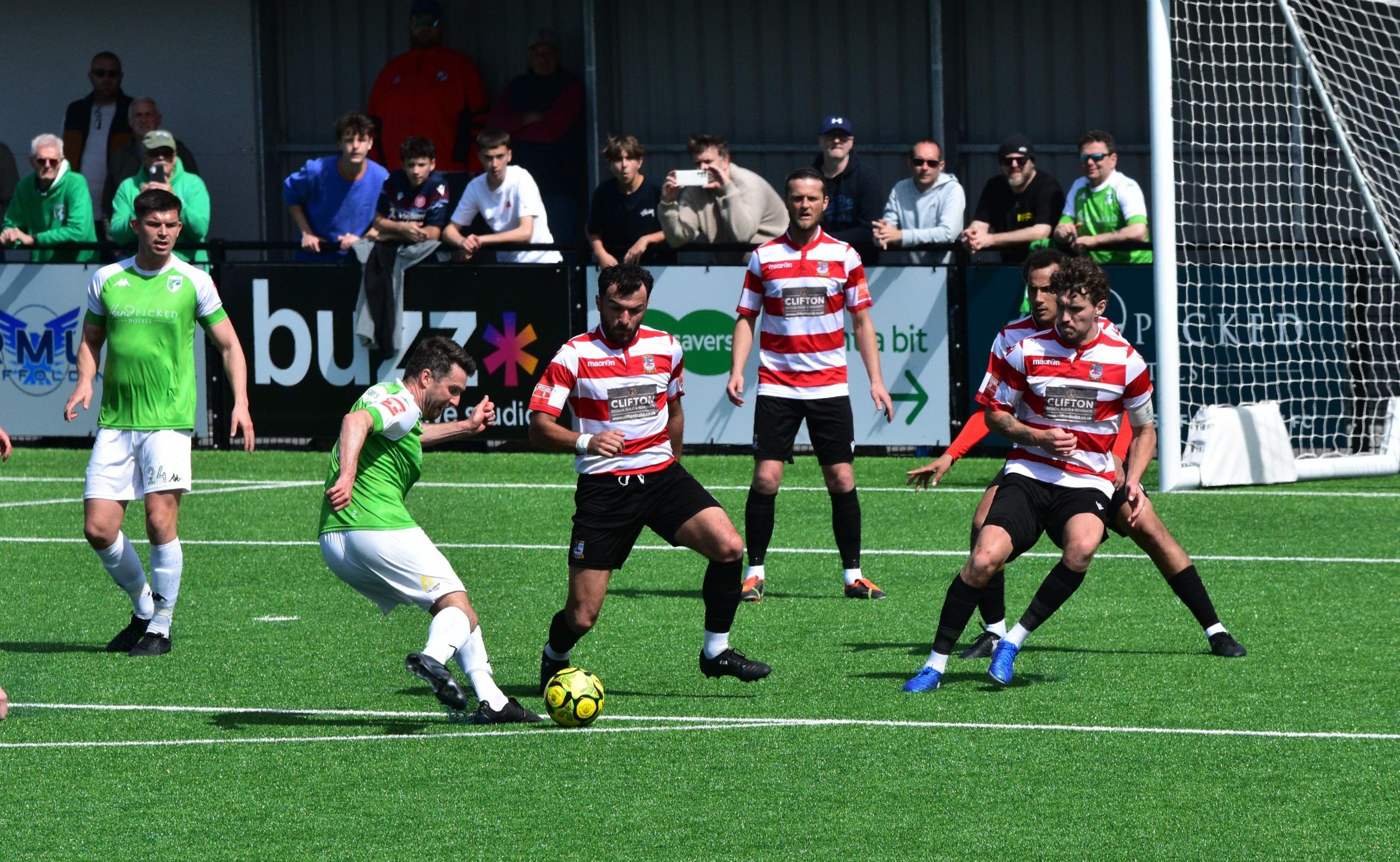 Ross Allen takes a shot for Guernsey FC
