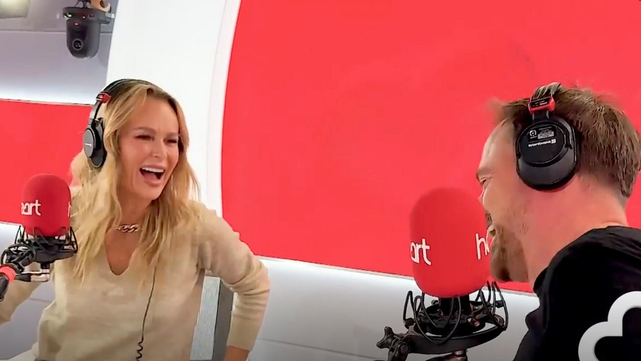 Jamie Theakston and Amanda Holden chatting on the Friday Heart Radio Breakfast show