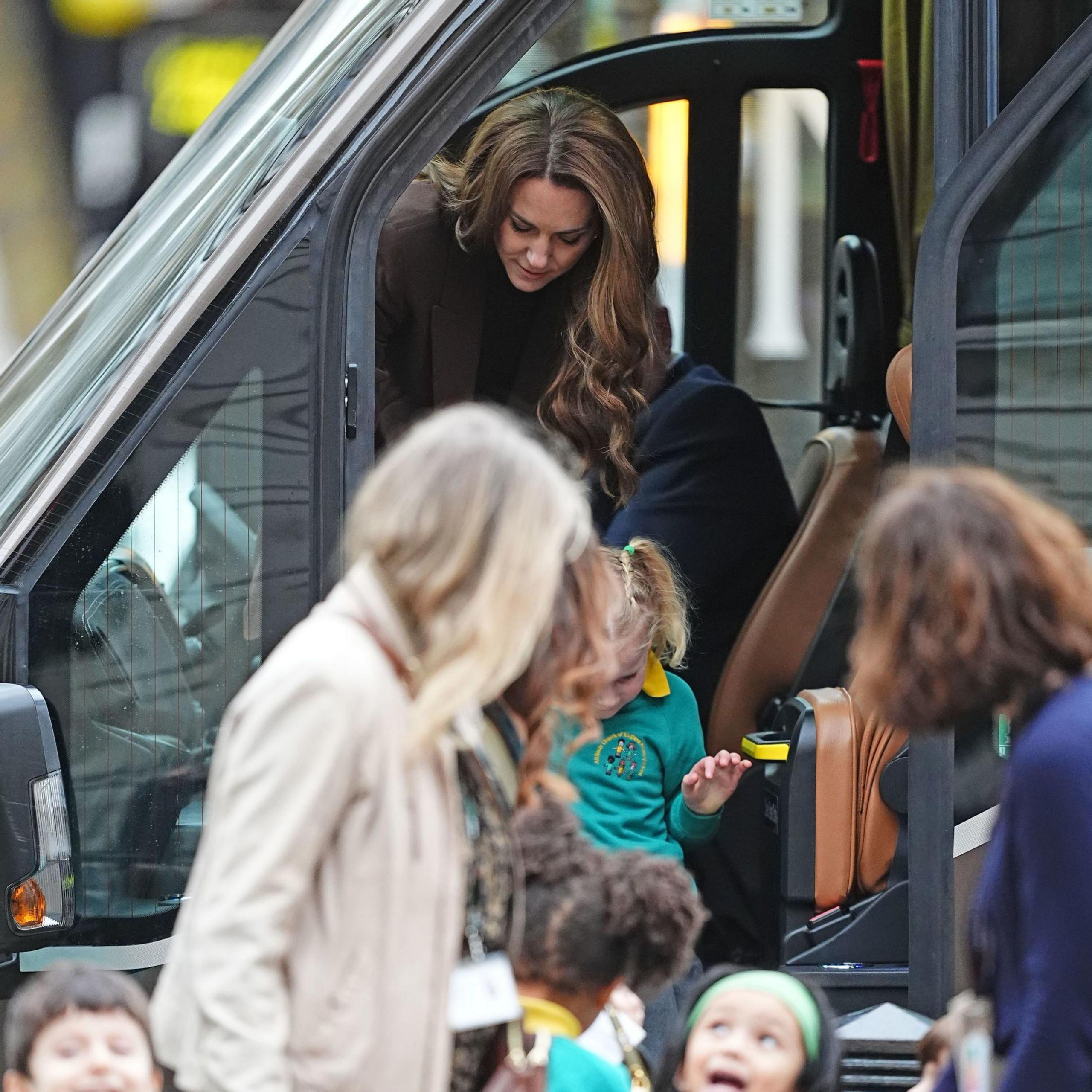 Princess of Wales arriving in the school minibus to see the gallery's exhibition