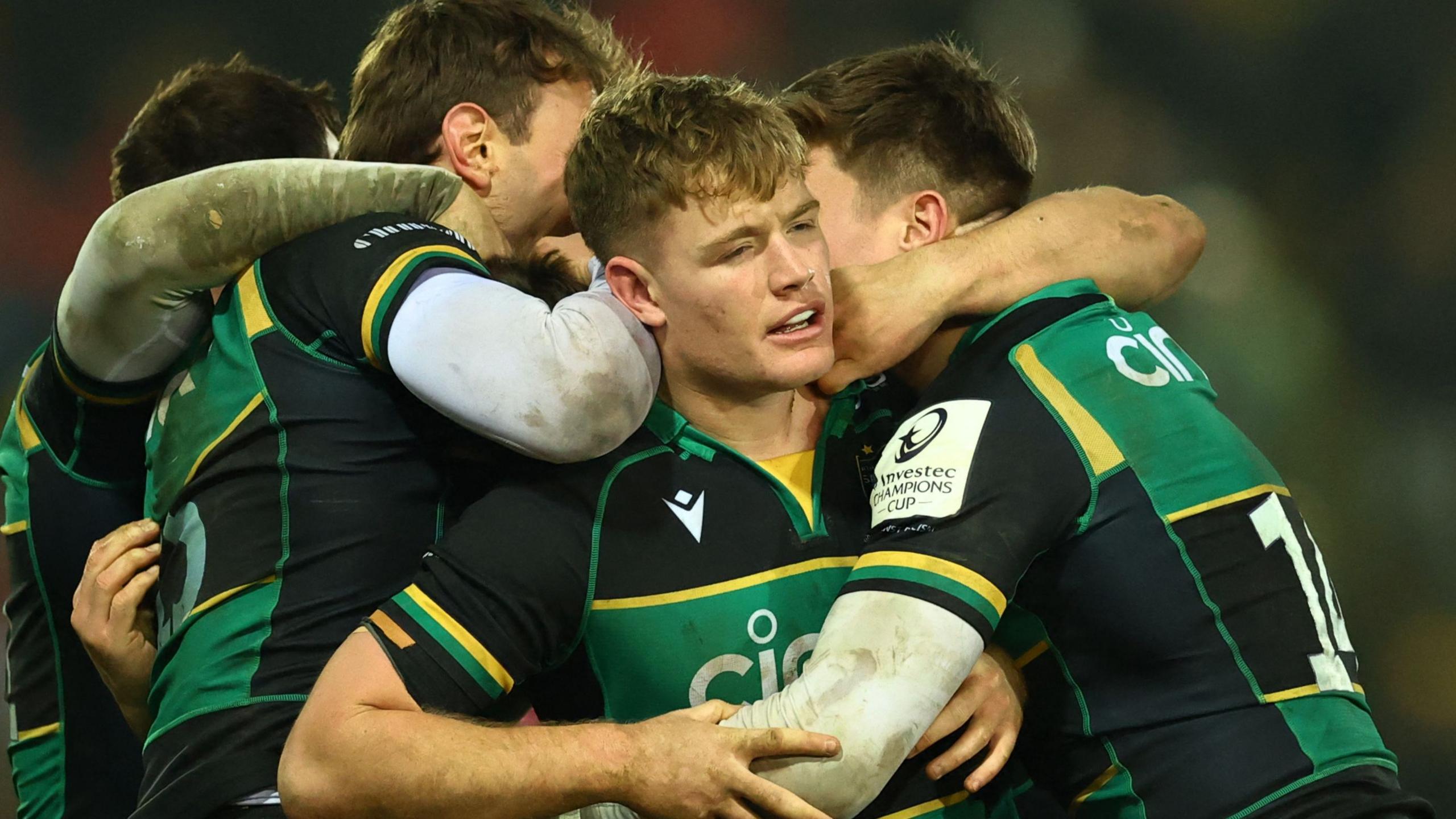 Northampton Saints' Fin Smith celebrates with team-mates